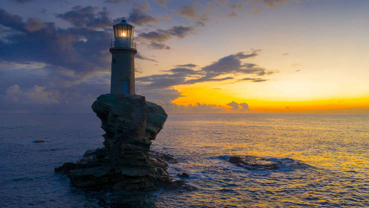Diapositivo 2 de 37: The beautiful Lighthouse Tourlitis of Chora in Andros island, Cyclades, Greece.