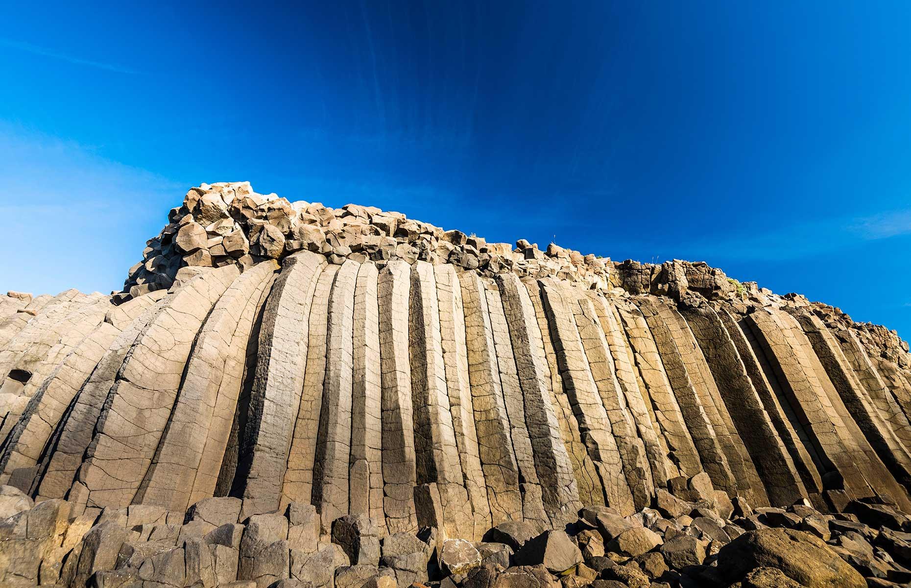 <p>It might not sound particularly thrilling, but Penghu’s basalt columns are one of the most striking natural sights in Taiwan. The Penghu archipelago is made up of 90 islands which mostly consist of basalt (or lava rock), so it’s no wonder Penghu is otherwise known as the Home of Basalt. The best one to see is the Daguoye column in Xiyu Township, where centuries of seawater and sea breezes have eroded the site into the unique structure that stands today. It looks even more impressive after a spout of heavy rainfall. </p>