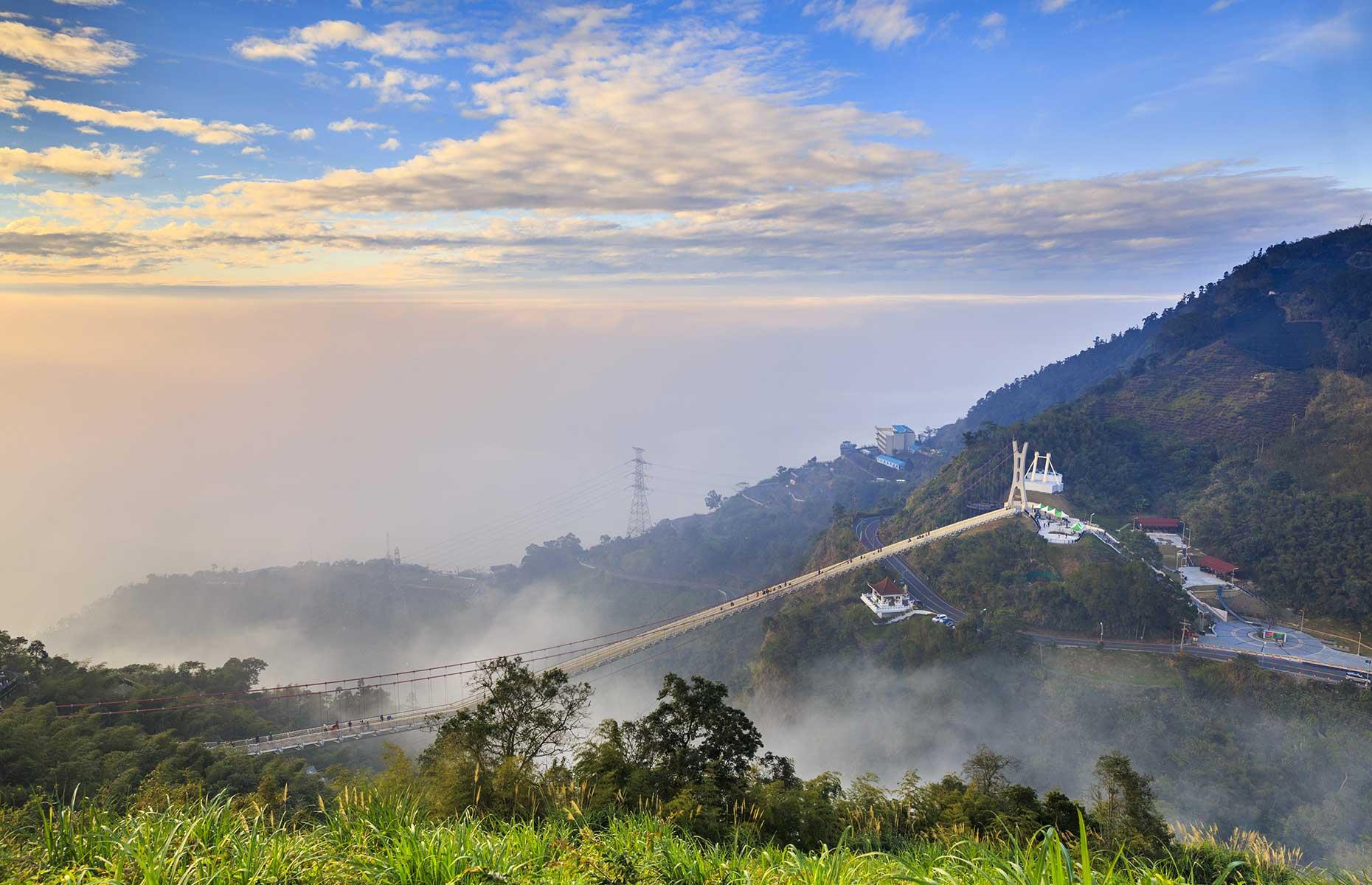 <p>Afraid of heights? Then steer clear of Taiping Suspension Bridge. At 3,281 feet (1,000m) above sea level, this is the highest scenic bridge in Taiwan, spanning 922 feet (281m) between Taipingshan and Guishan. As you take in one of the most scenic spots in Taiwan, enjoy the birds-eye views of the Chiayi-Tainan Plain and the Taiwan Strait, as well as the iconic 36 hairpin road bends of Meishan. The best time to visit is in the evenings (6-10pm) when the bridge lights up a different color each day of the week. </p>