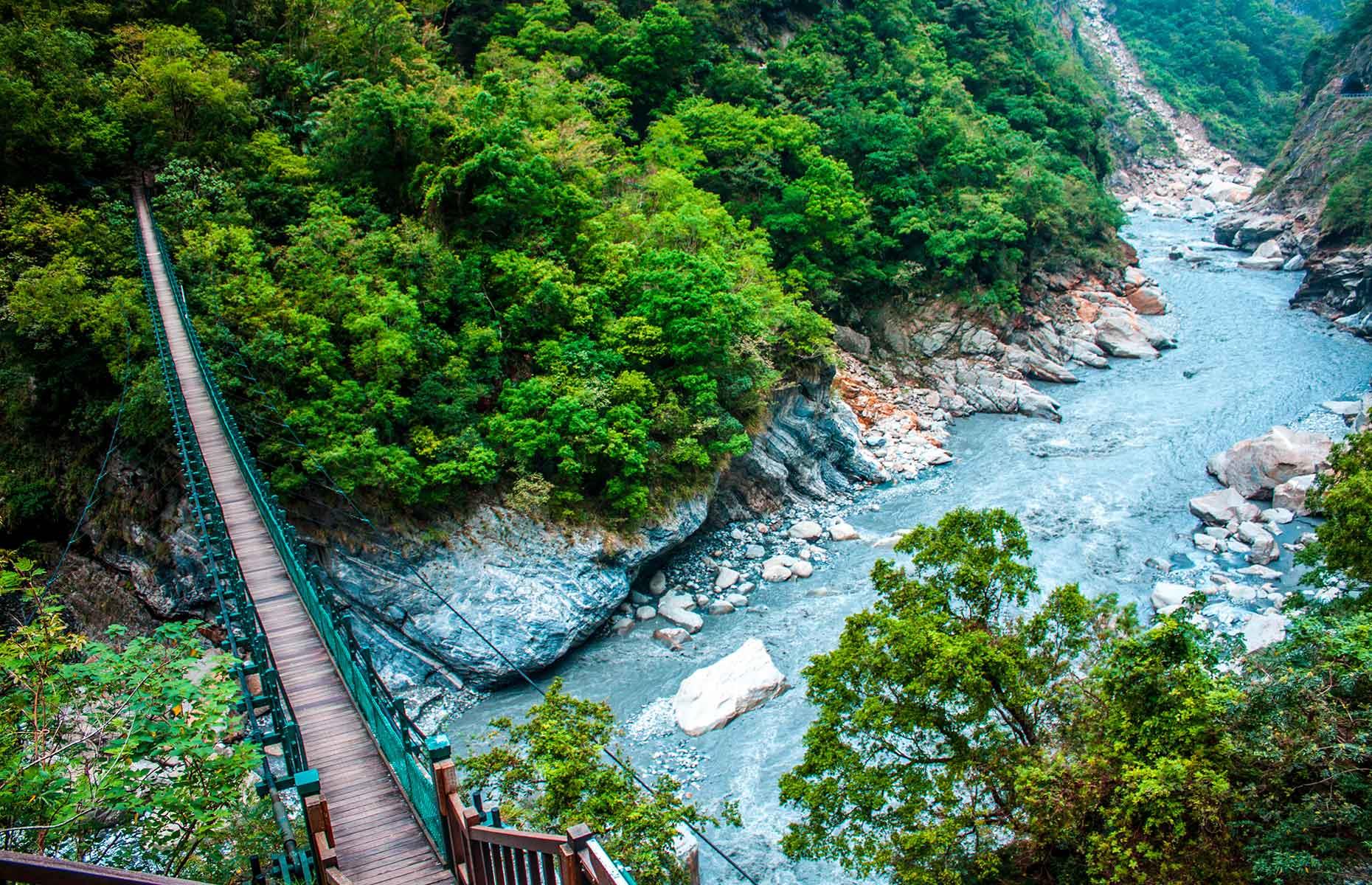 <p>Taroko Gorge is what Hualien County is pretty much best known for. This natural wonder is located in Taroko National Park and was named after the indigenous Truku tribe. Its marble cliffs are carpeted in subtropical forests with emerald-colored rivers winding their way through. There are hundreds of bird and butterfly species that live in the crags and, thanks to its vast size, more than enough places to find a spot of quiet – the 1.24-mile-long (2km) Lushui Trail is a highlight.</p>