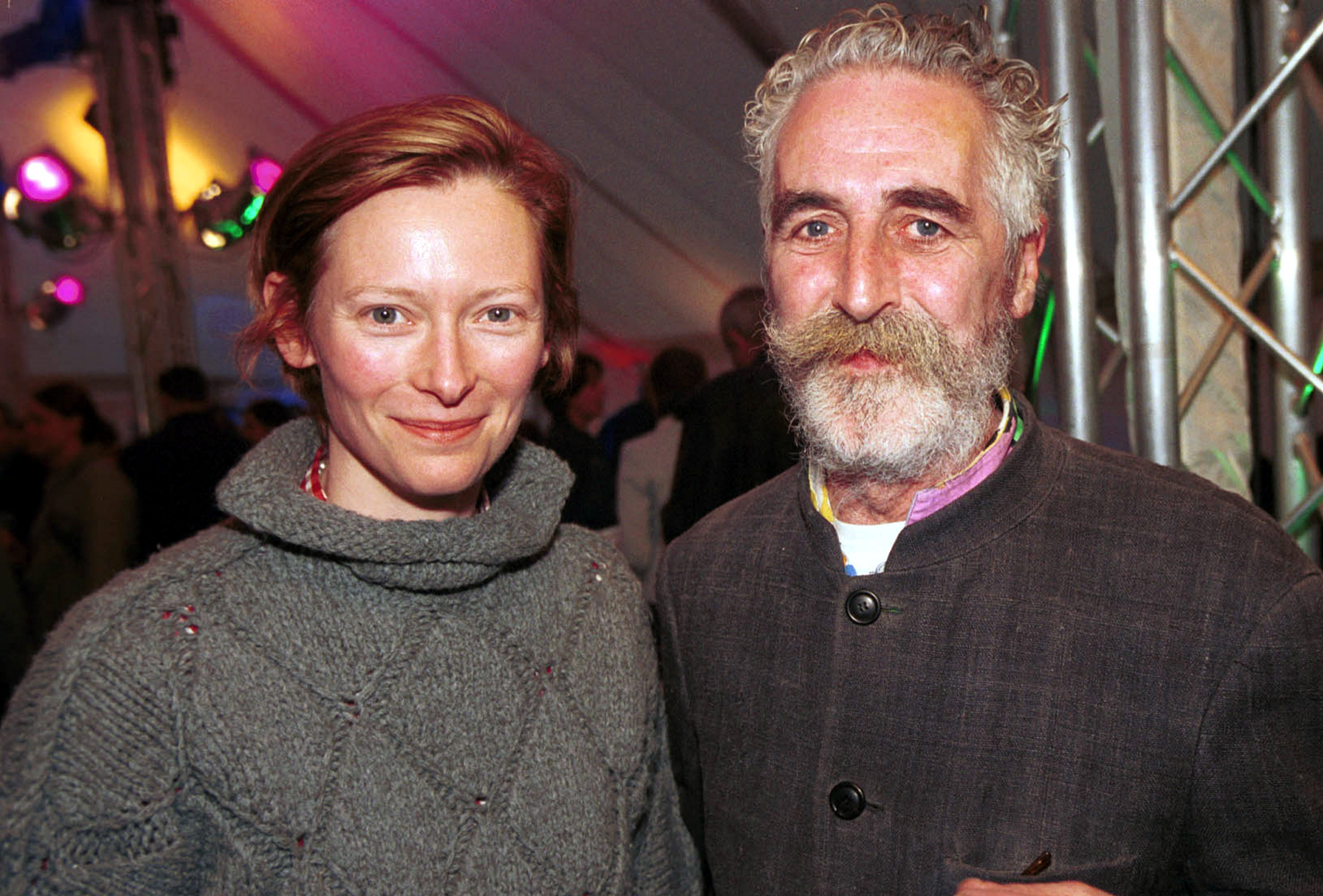 <p>Actress Tilda Swinton and her former partner, Scottish playwright and artist John Byrne, are seen here in 2004 -- more than six years after they welcomed twins Xavier and Honor Swinton Byrne into the world. Keep reading to see their twins as adults...</p>