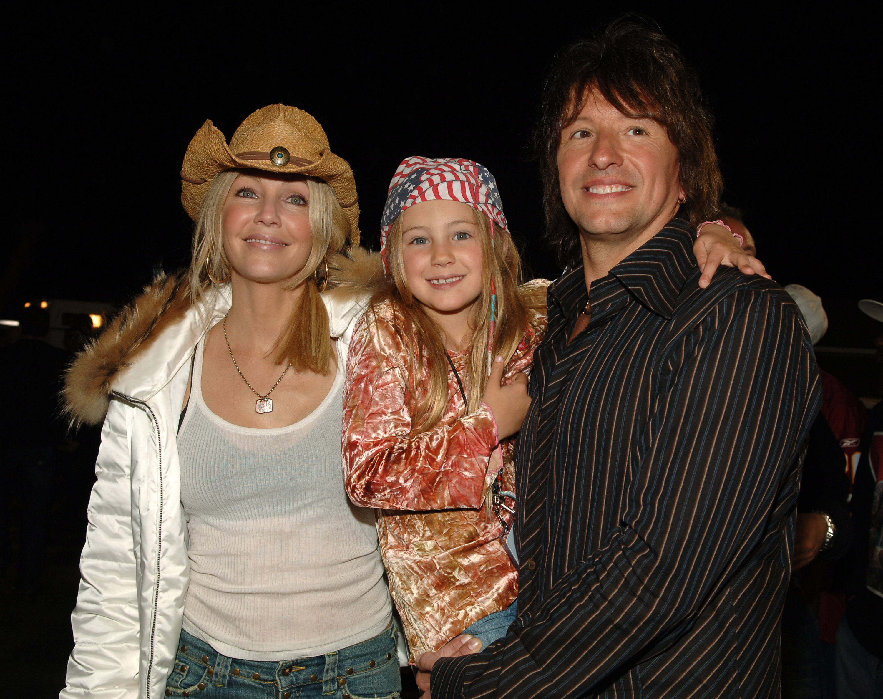 <p>Heather Locklear, then-husband Richie Sambora and their only child, a then-7-year-old Ava Sambora, attended the Rockin' the Corps Concert: An American Thank You Celebration for U.S. Marines on April 1, 2005. The "Dynasty" and "Melrose Place" actress and the Bon Jovi guitarist split the following year. </p>
