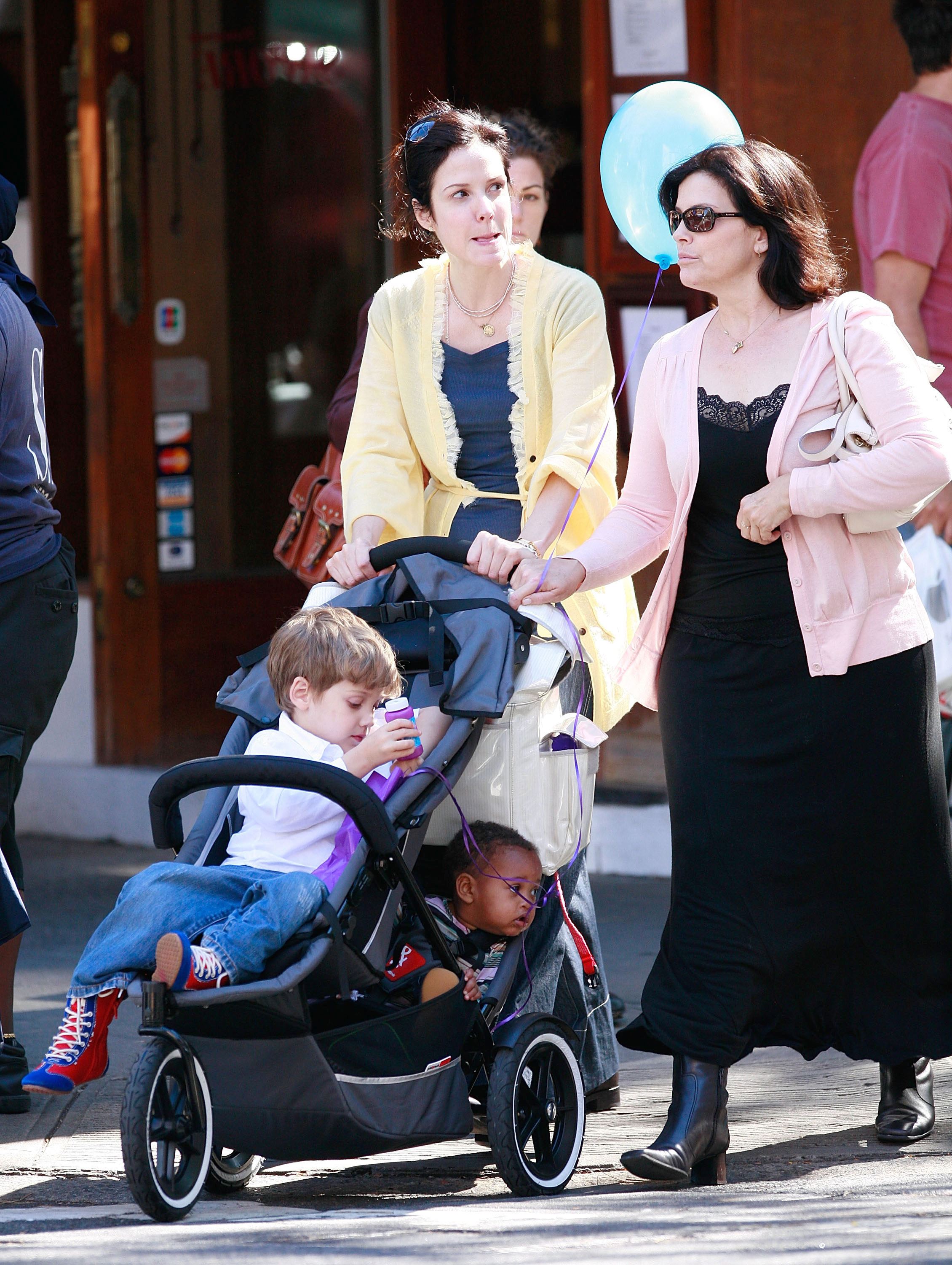 <p>Mary-Louise Parker, then-3-year-old son William Atticus Parker -- whose dad, actor Billy Crudup, famously ended his long romance with the actress when she was pregnant -- and then-newly adopted baby daughter Caroline Aberash Parker joined Mary-Louise's mother for a walk in New York City's SoHo district on Sept. 29, 2007. Keep reading to see her kids as teenagers...</p>