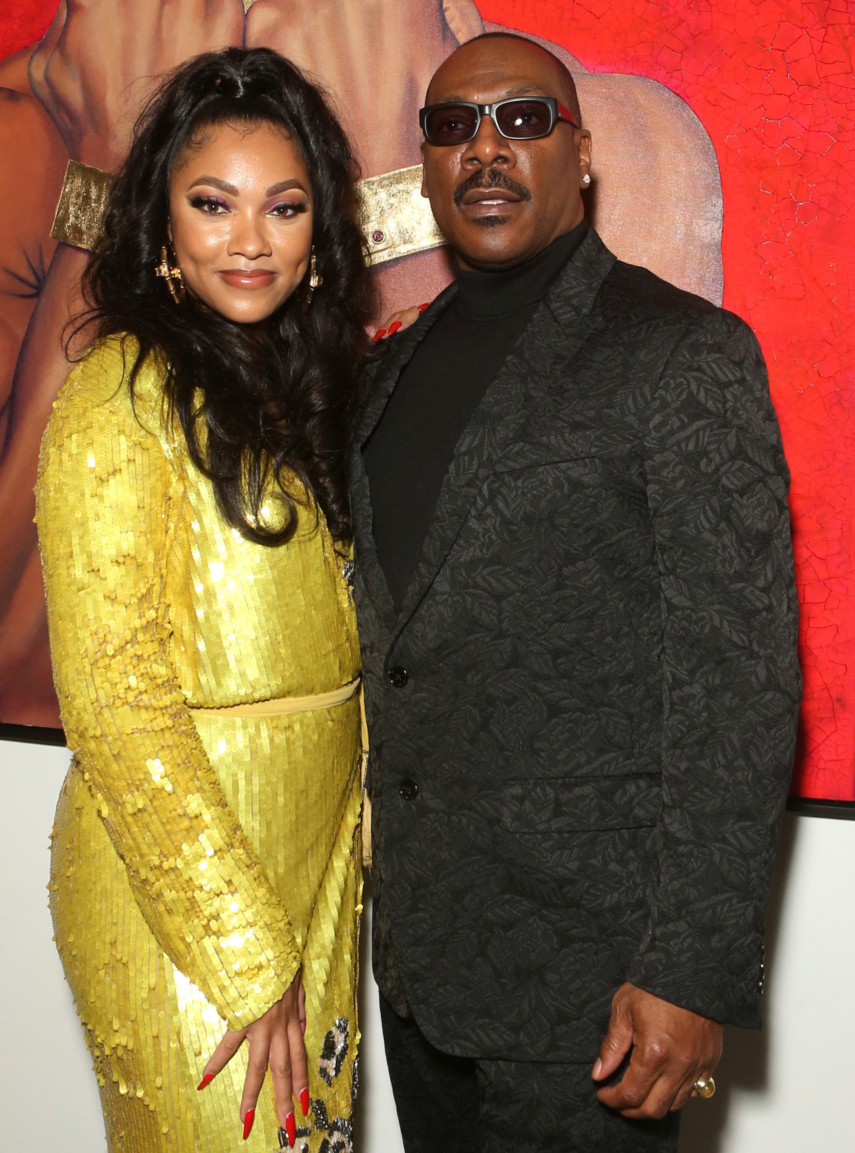 <p>Bria Murphy, who was born in 1989, and dad Eddie Murphy posed together at the <a href="https://www.wonderwall.com/news/pamela-anderson-hits-back-ex-jon-peters-claims-about-why-she-married-him-money-plus-more-news-february-21-2020-3022316.gallery?photoId=1075255">model/actress-turned-artist's painting exhibition</a> at the ARTUS Gallery in Los Angeles on Feb. 20, 2020.</p>