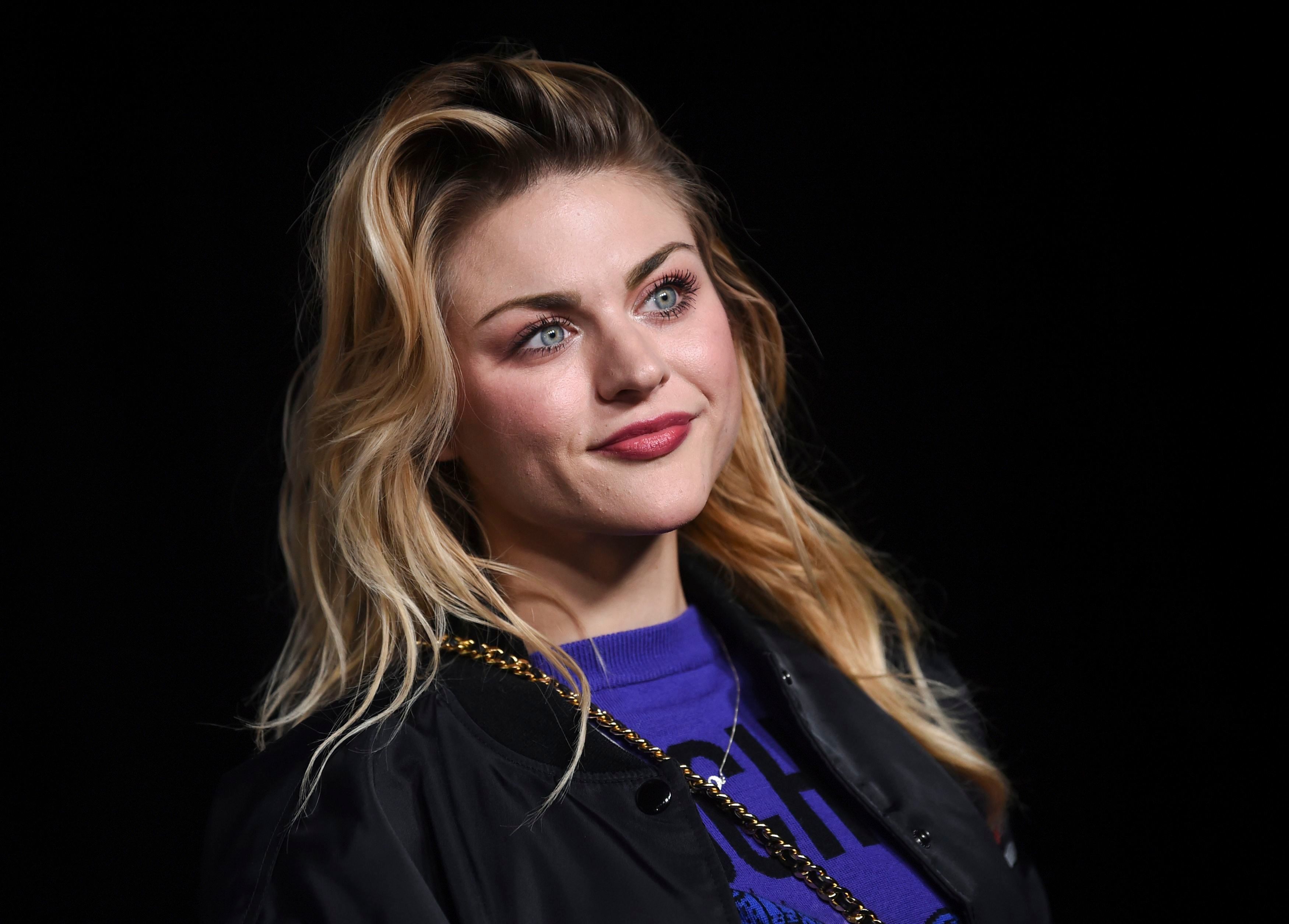 <p>Frances Bean Cobain hasn't exactly become a musician like her parents, Kurt Cobain and <a href="https://www.wonderwall.com/celebrity/profiles/overview/courtney-love-806.article">Courtney Love</a> (though she did debut an original song -- she has a beautiful voice -- on social media in 2018). Instead, she's more of a <a href="http://www.wonderwall.com/celebrity/profiles/life-in-photos-frances-bean-cobain-21310.gallery?photoId=92347">visual artist</a>. She also <a href="http://www.wonderwall.com/entertainment/courtney-love-frances-cobain-hug-it-out-for-kurt-cobain-movie-premiere-at-sundance-1857121.article">executive produced</a> "Kurt Cobain: Montage of Heck," the 2015 HBO documentary about her dad's life. In March 2016, Frances (who was born in 1992) <a href="http://www.wonderwall.com/news/frances-bean-cobain-divorce-isaiah-silva-1913321.article">filed for divorce</a> from husband Isaiah Silva, whom she married in June 2014. She's seen here at the Moschino x H&M fashion show in New York City on Oct. 24, 2018.</p>