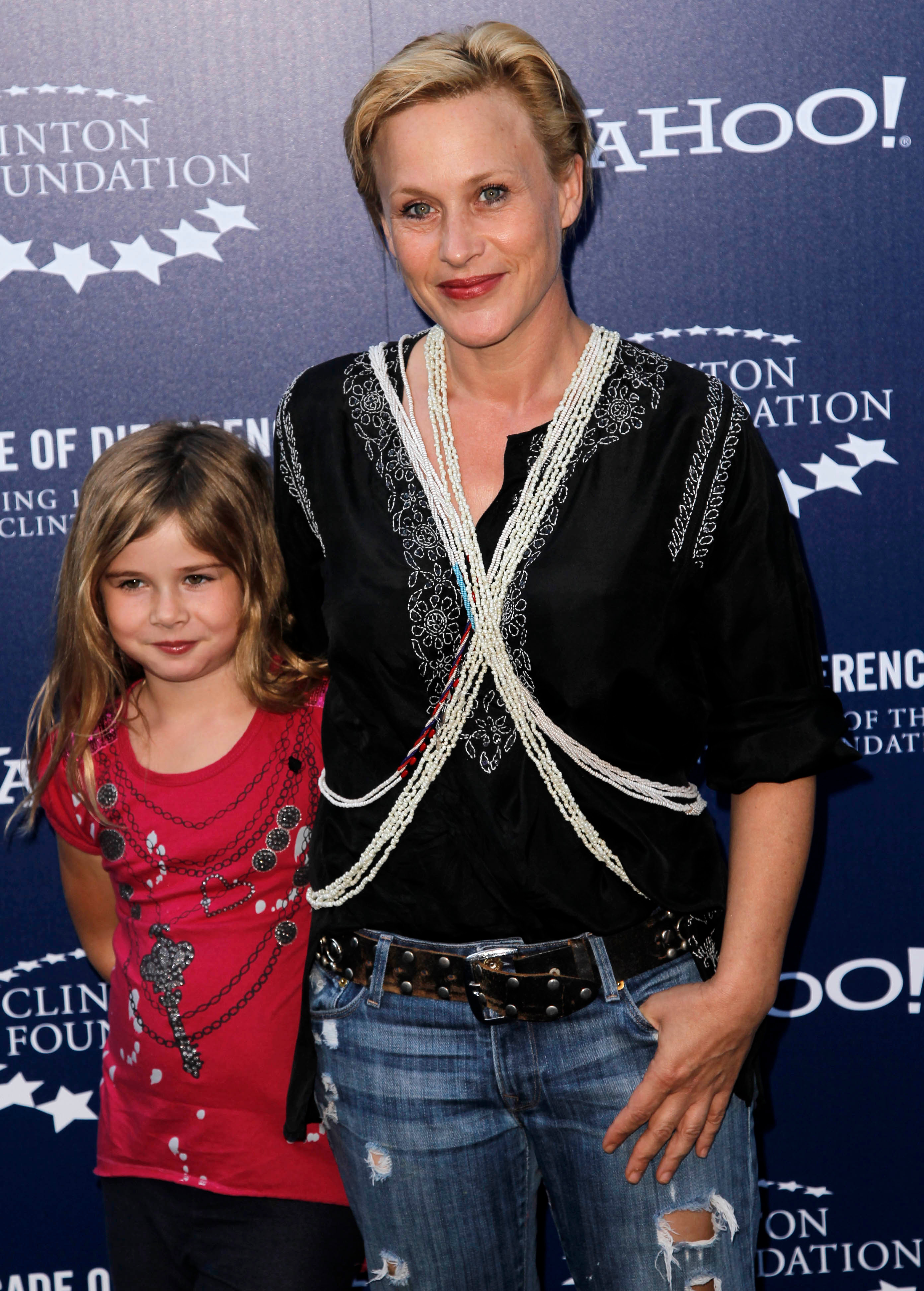 <p>Patricia Arquette brought then-8-year-old daughter Harlow Jane to the "A Decade of Difference" concert at the Hollywood Bowl in Los Angeles to celebrate 10 years of the William J. Clinton Foundation, on Oct. 15, 2011. The same year, Patricia's divorce from Harlow's dad, actor Thomas Jane, was finalized. </p>