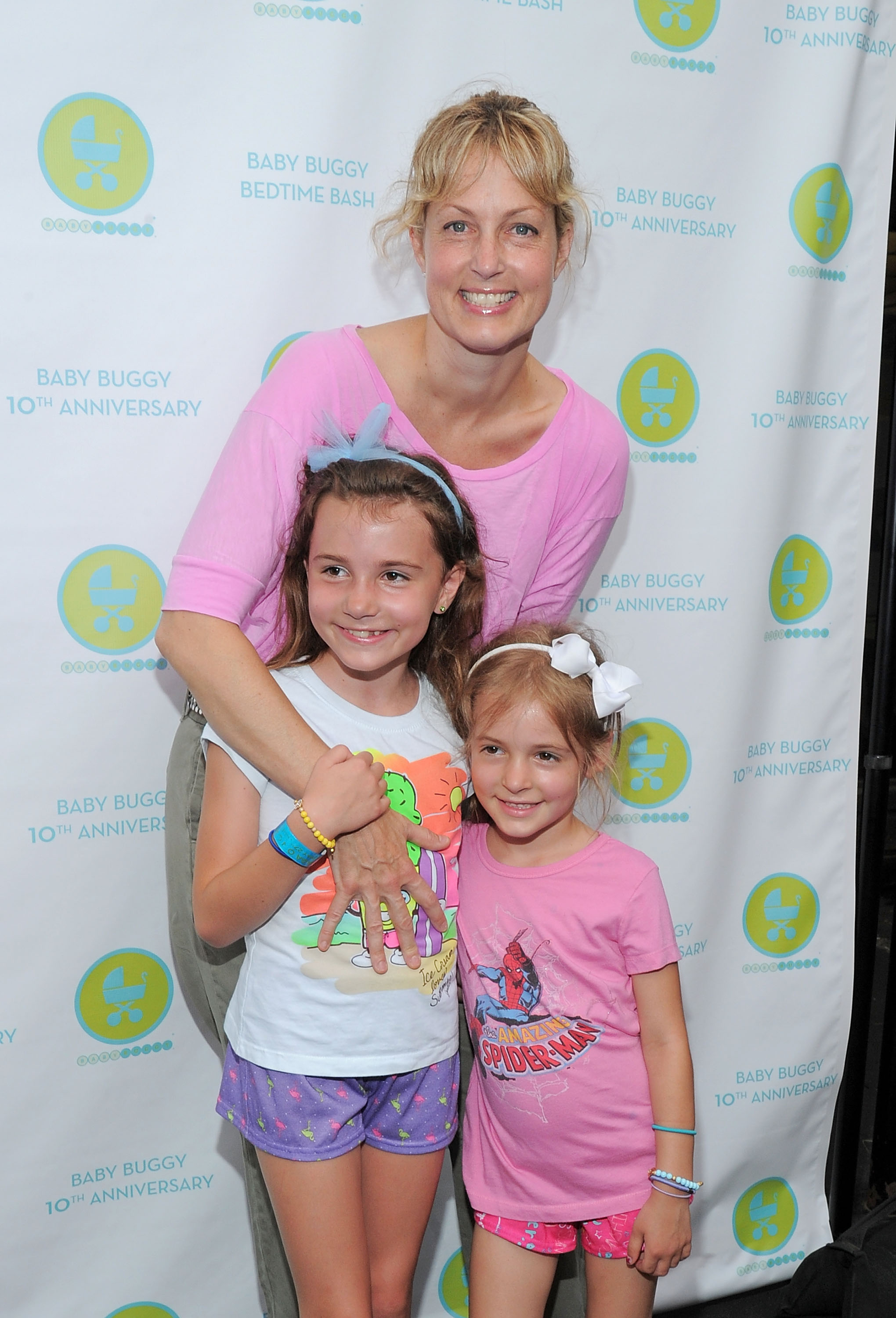 <p>Actress, comedy star and author Ali Wentworth took her daughters with husband George Stephanopoulos -- Elliott (then 8) and Harper (then almost 5) -- to a charity event at Wollman Rink in New York City's Central Park on June 1, 2011. Keep reading to see their oldest on prom night in 2021...</p>