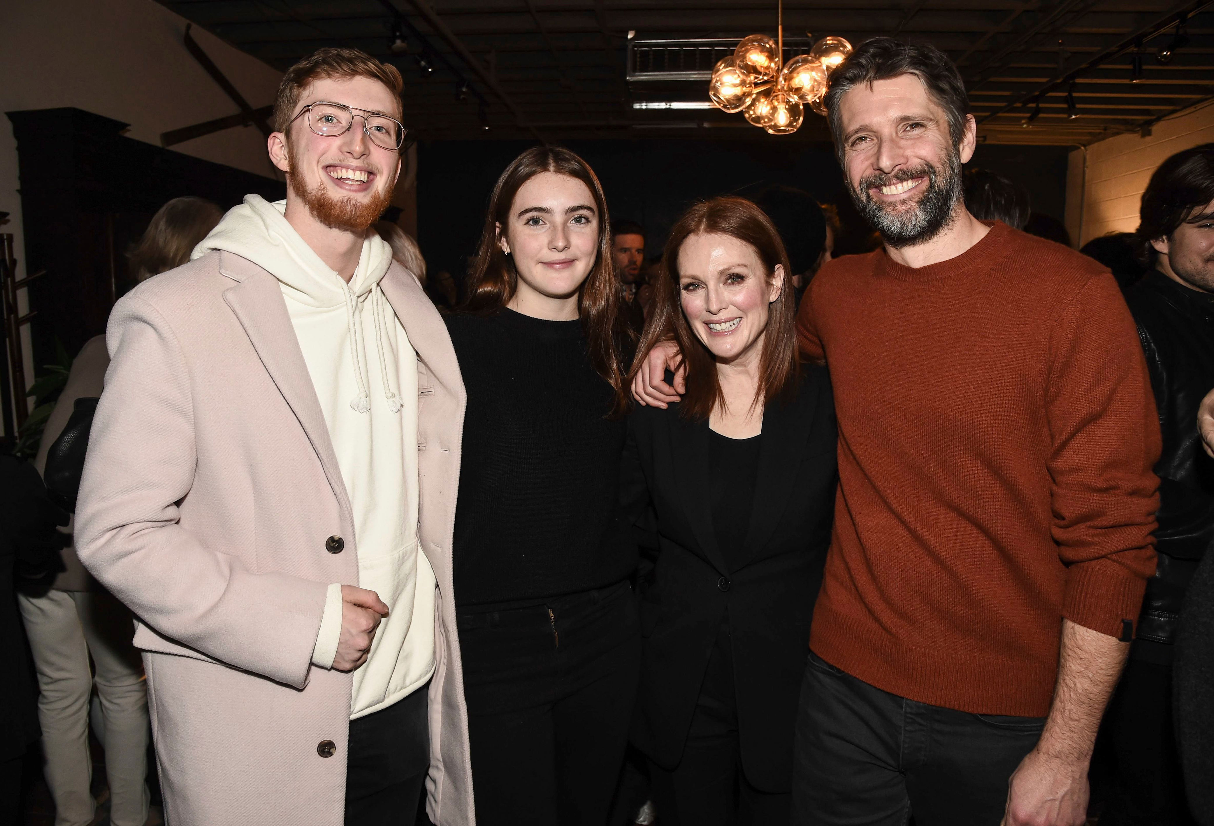 <p><a href="https://www.wonderwall.com/celebrity/profiles/overview/julianne-moore-1047.article">Julianne Moore</a> and director husband Bart Freundlich's kids -- son Caleb (who was born in 1997) and daughter Liv (who was born in 2002) -- joined Mom and Dad at the "After the Wedding" cast dinner hosted by Chase Sapphire on Main during the <a href="https://www.wonderwall.com/awards-events/sundance-film-festival-2019-celebrities-park-city-3018163.gallery">Sundance Film Festival</a> in Park City, Utah, on Jan. 24, 2019.</p>