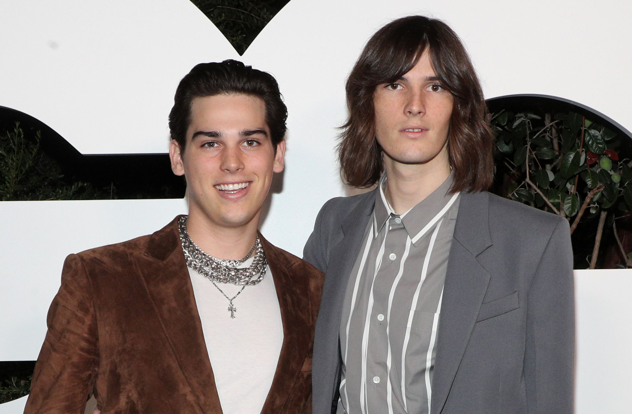 <p>Paris Brosnan (left, who was born in 2001) is seen here with big brother Dylan Brosnan (who was born in 1997), posing on the red carpet at the GQ Men of the Year event in Los Angeles in November 2021. The siblings, who've both worked as models, <a href="https://www.wonderwall.com/awards-events/golden-globes/2020-golden-globe-awards-what-has-everyone-talking-whats-buzzing-trending-3021935.gallery?photoId=1070386">served as Golden Globes Ambassadors in 2020</a>.</p>