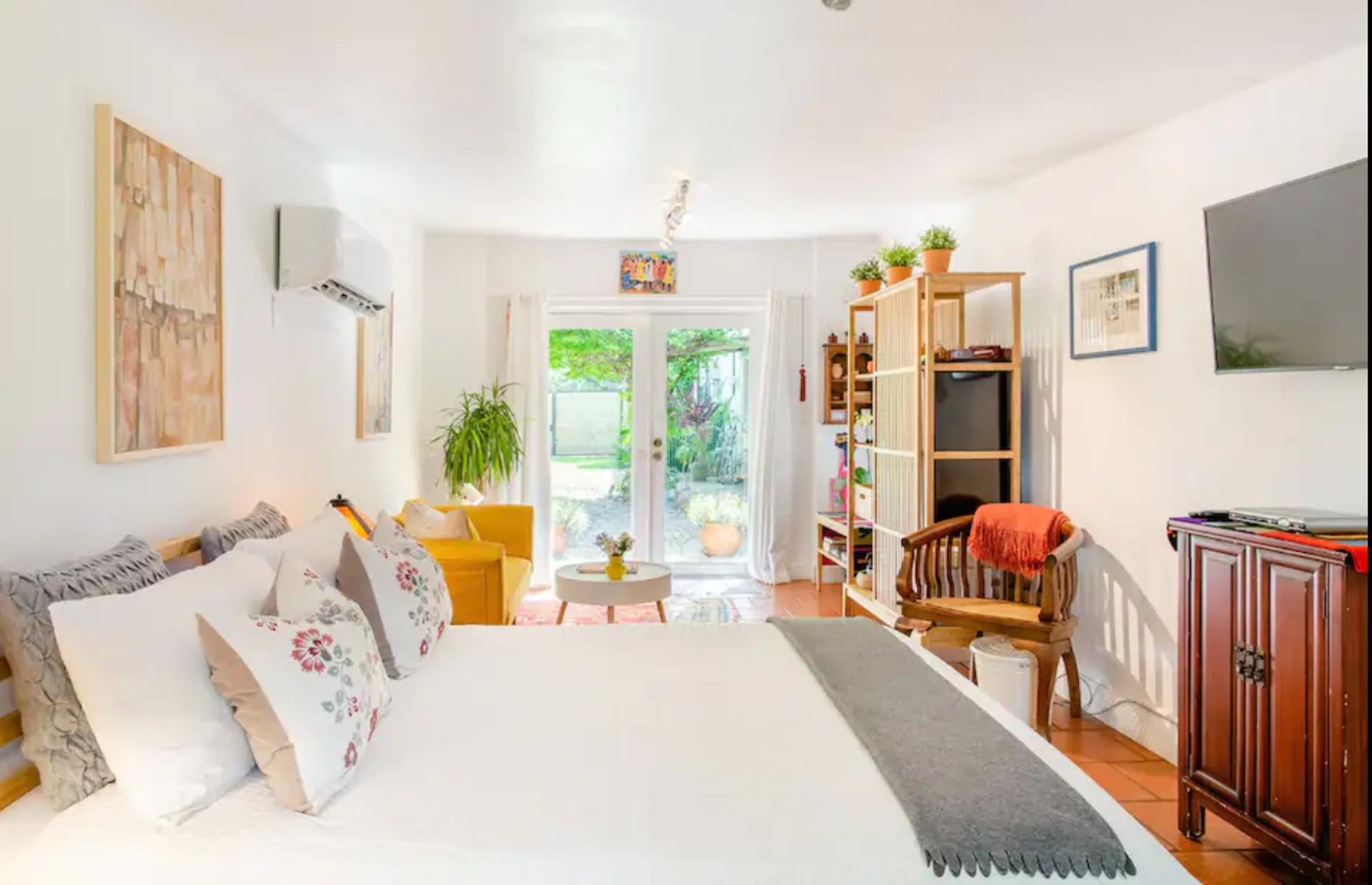 <p>Located just a 15-minute walk from the beach in Biscayne Park, just outside Miami, <a href="https://www.airbnb.co.uk/rooms/4293449">this oh-so-pretty cottage</a> is surrounded by charming tropical gardens and comes with use of the owners’ pool and cabana. Available from around $100 per night with a three-night minimum stay, the cottage has free parking and is beautifully furnished inside. It comes with a microwave and refrigerator, and windows frame views of the palm-tree-filled garden.</p>