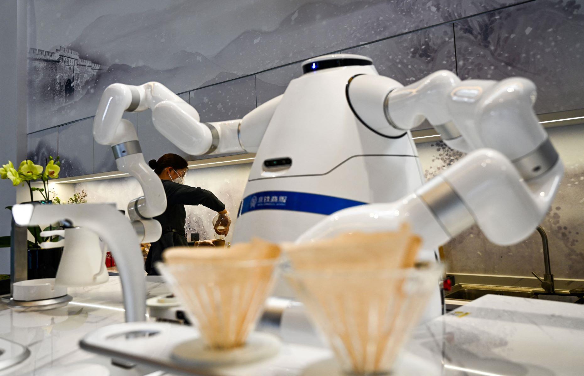<p>How do you take your coffee? At Taizicheng Railway Station in Zhangjiakou, a terminal just over a mile from Beijing's Olympic Village, it's served by an unusual barista. From grinding the beans to cleaning up afterwards, this clever robot can carry out the whole coffee-making process in around five minutes.</p>  <p>You don't even need to order at the counter; simply use your phone to scan the QR code for the drink you want and wait while technology takes care of the rest. </p>