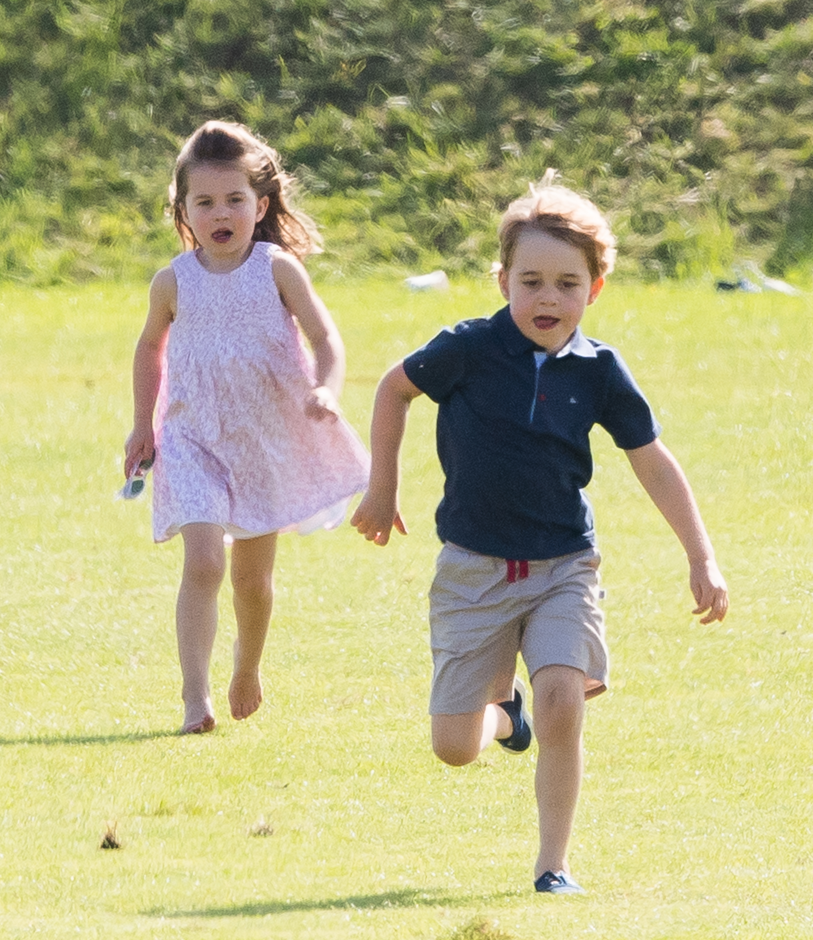 <p>Princess Charlotte and Prince George ran around together in a field next to the Maserati Royal Charity Polo Trophy match -- dad <a href="https://www.wonderwall.com/celebrity/profiles/overview/prince-william-482.article">Prince William</a> was competing -- at Beaufort Park in Gloucester, England, on June 10, 2018.</p>
