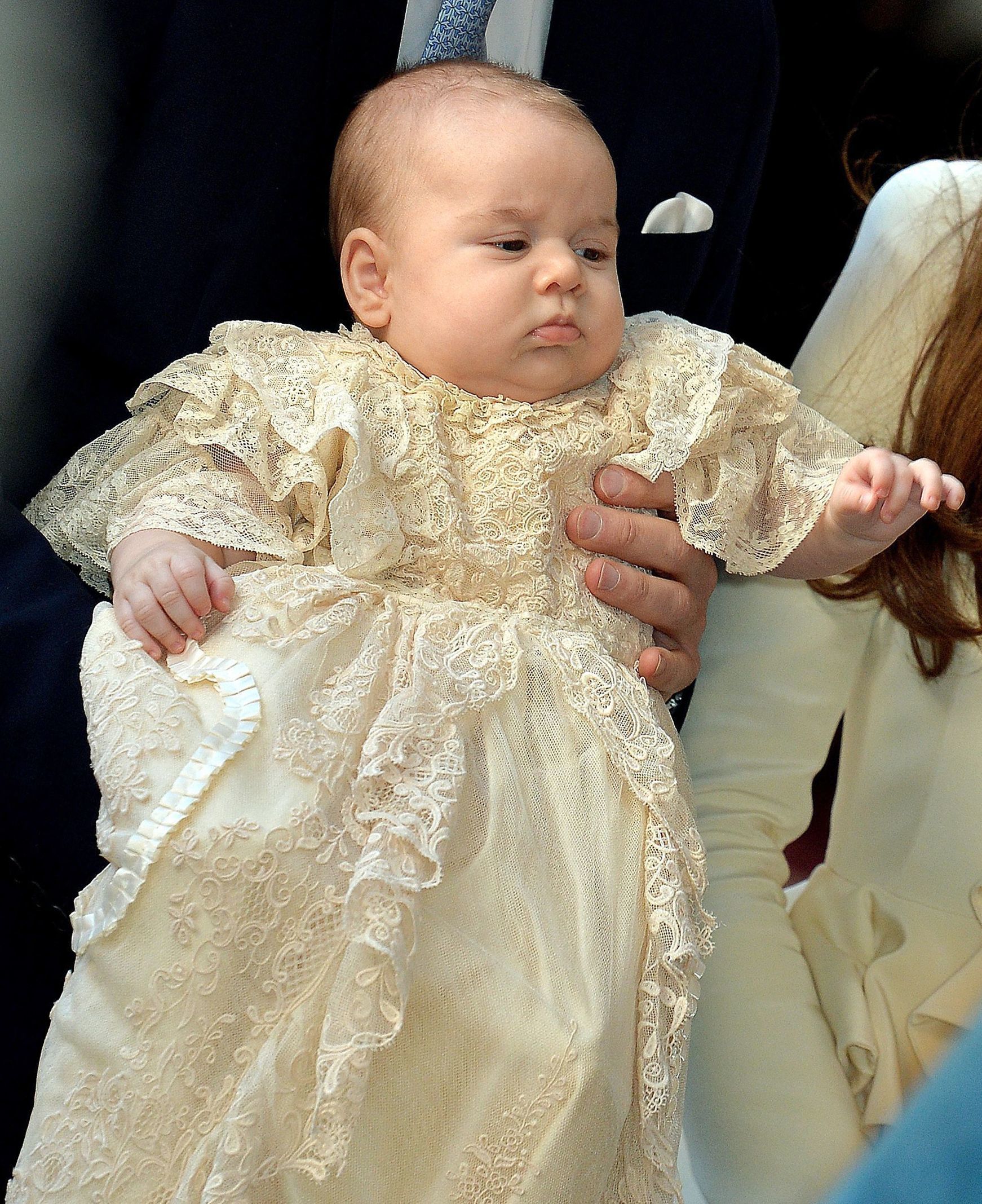 <p>Prince George was a lacy bundle of attitude before his christening at the Chapel Royal at St. James's Palace in London on Oct. 23, 2013.</p>