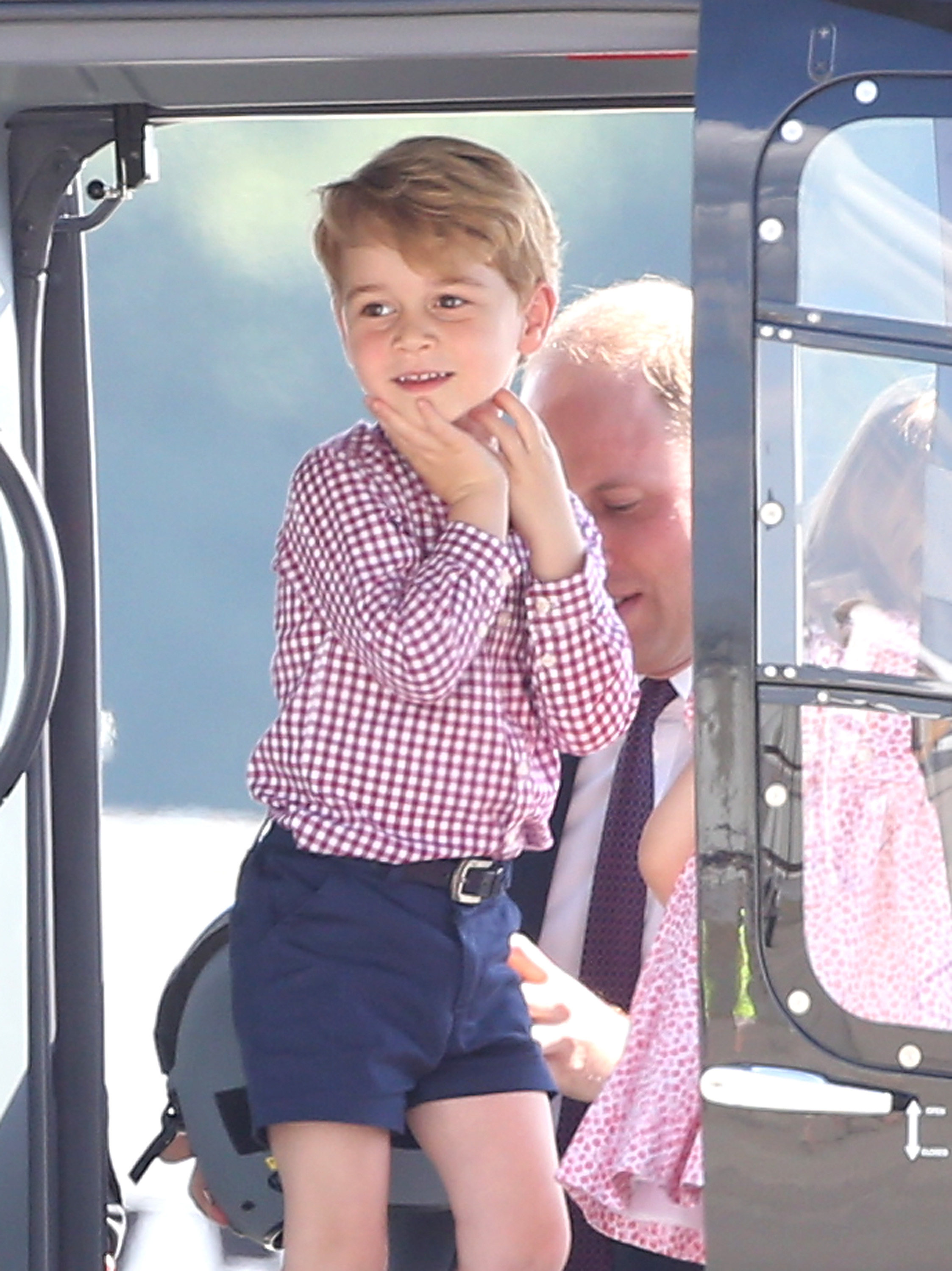 <p>Prince George checked out a helicopter before departing from Hamburg Airport on the last day of his parents' official visit to Germany on July 21, 2017.</p>