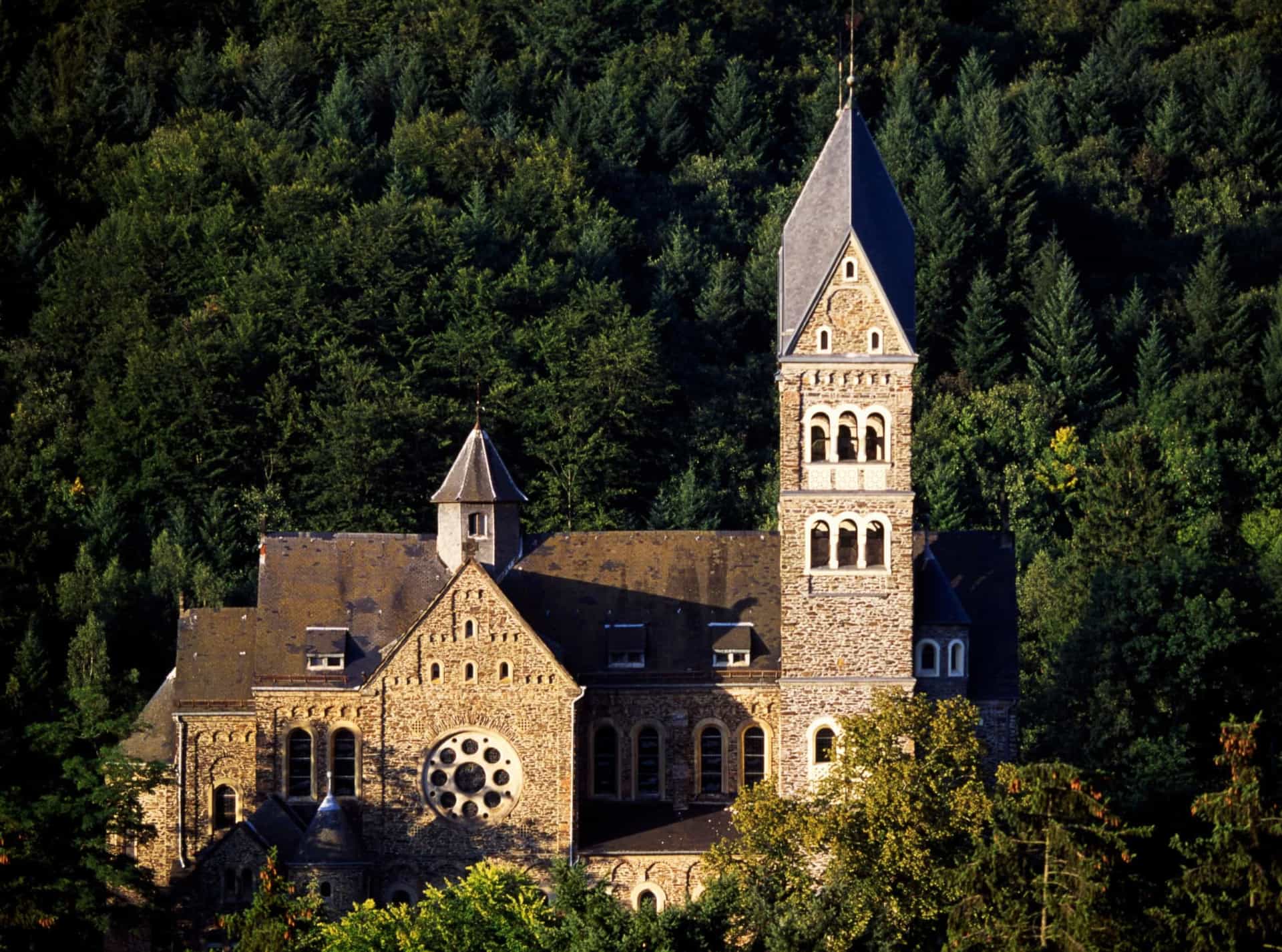 <p>Competing with Wiltz for stunning visual appeal is Clervaux. The town is also associated with the Battle of the Bulge, more specifically the December 1944 Battle of Clervaux, which ended in disaster for American forces after they were encircled by numerically superior German troops. A survivor of the brutal engagement is the Benedictine Abbey of St. Maurice and St. Maur (also known as Clervaux Abbey), built in 1910 and a cherished regional landmark.</p>