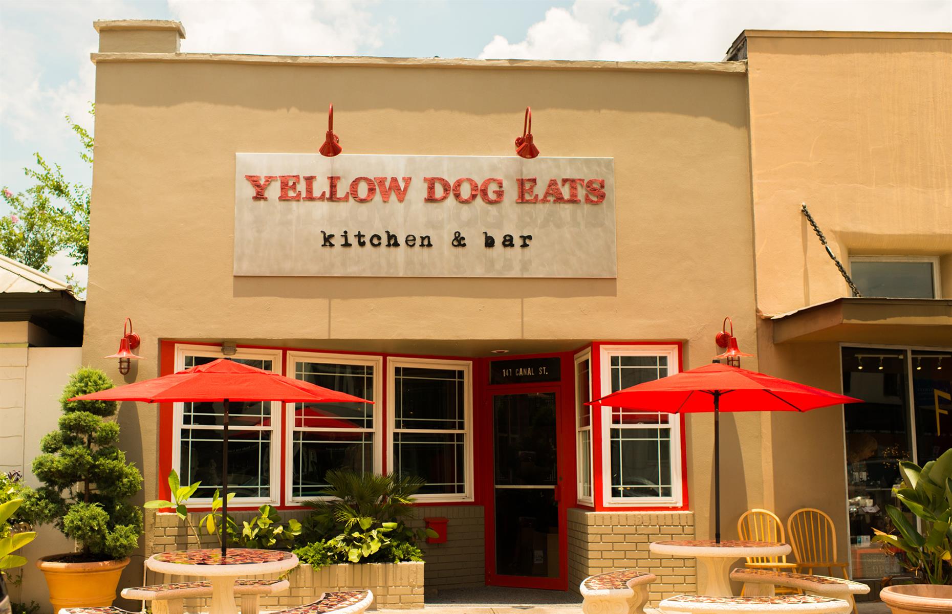 <p>Just a block away from the shores of the Indian River North in New Smyrna Beach – Florida's answer to the Hamptons – <a href="https://www.facebook.com/YDEkitchenbar/">Yellow Dog Eats Kitchen and Bar</a> has <a href="https://www.yelp.com/biz/yellow-dog-eats-kitchen-and-bar-new-smyrna-beach">an epic menu</a>. Expect pulled pork sandwiches, Mexican wraps, vegetarian nachos and tacos, plus other sandwiches featuring fresh salmon, tuna or turkey with maple roasted bacon. There's craft beer on tap and a decent wine list, and the dogs will get plenty of fuss when you visit. </p>