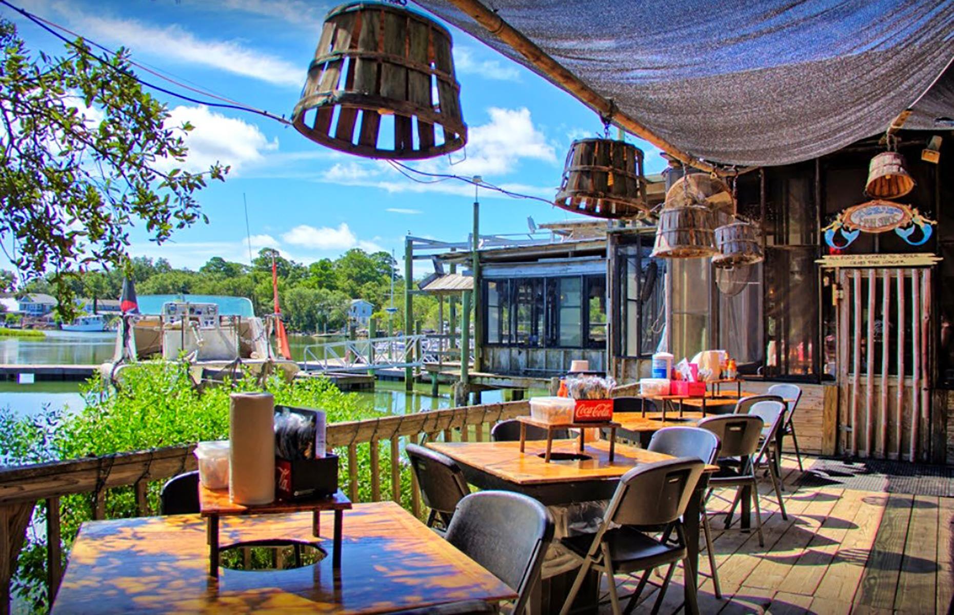 <p>What started as a modest seafood shack overlooking Chimney Creek is now <a href="http://thecrabshack.com/">a Tybee Island institution</a>. A casual attitude – their motto is "where the elite eat in bare feet" – and <a href="https://www.tripadvisor.co.uk/ShowUserReviews-g35328-d436975-r721553649-The_Crab_Shack-Tybee_Island_Georgia.html">some supremely good seafood</a> make this a place worth traveling for. Raw oysters and clam chowder are superb starters, while a snow crab boil with shrimp, corn and potatoes or a full platter of locally caught seafood will see away any rumbling stomachs. The spot is pet-friendly, so your pooch will enjoy the laid-back vibe and water views too. </p>