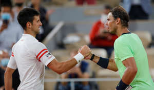 Novak Djokovic and Rafael Nadal shake hands