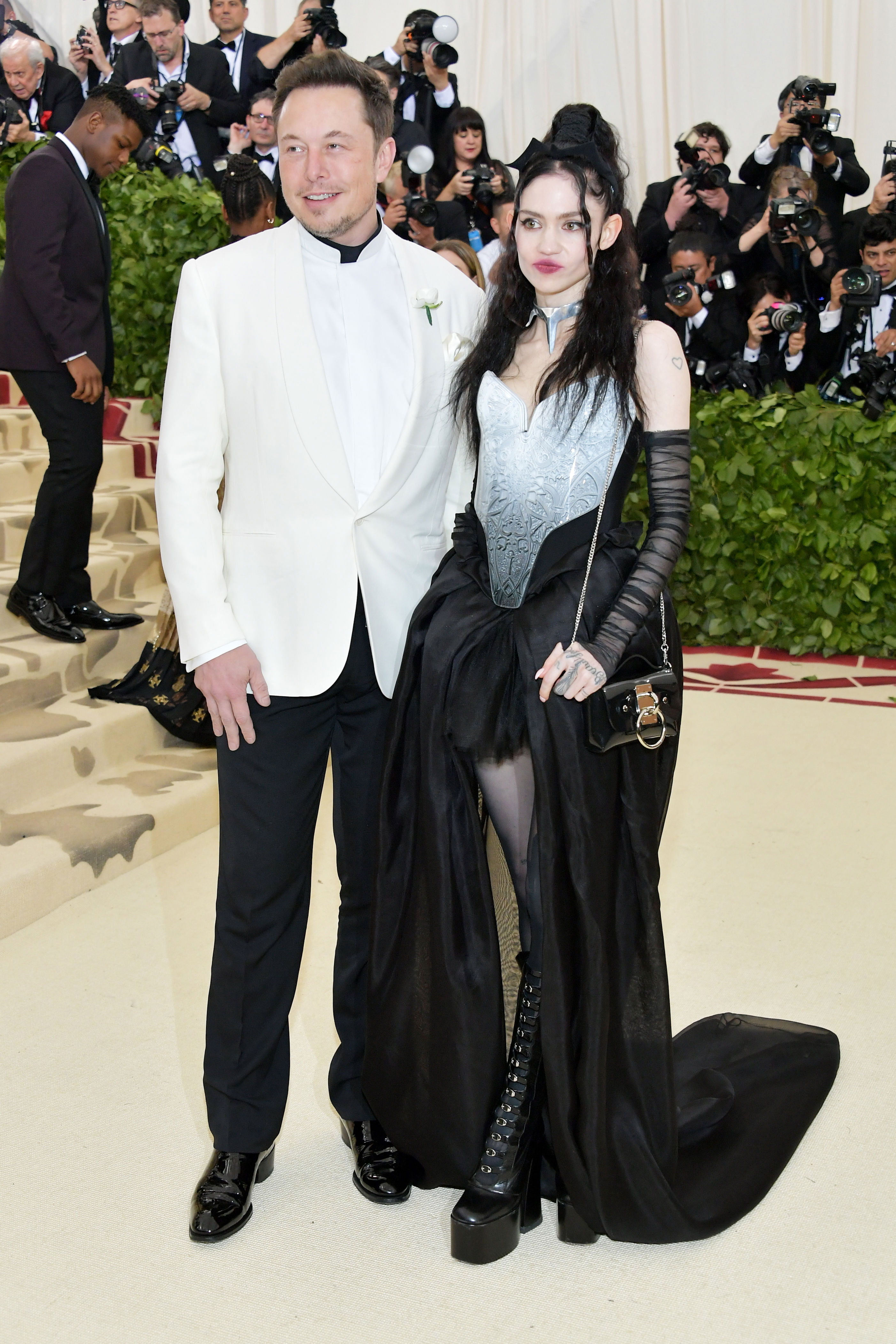 <p>Billionaire businessman Elon Musk and Canadian singer Grimes made their first public appearance as a couple at the <a href="https://www.wonderwall.com/style/fashion/2018-met-gala-see-all-stars-fashions-big-event-3014142.gallery">2018 Met Gala</a>. In 2020, the "Oblivion" singer welcomed her first child with the Tesla and SpaceX founder, who's 16 years her senior. The off-and-on couple welcomed a second child via surrogate in late 2021.</p>