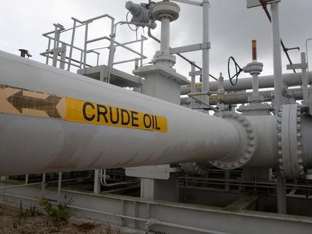 oil prices dip amid dollar strength; us inventory build spurs demand fears