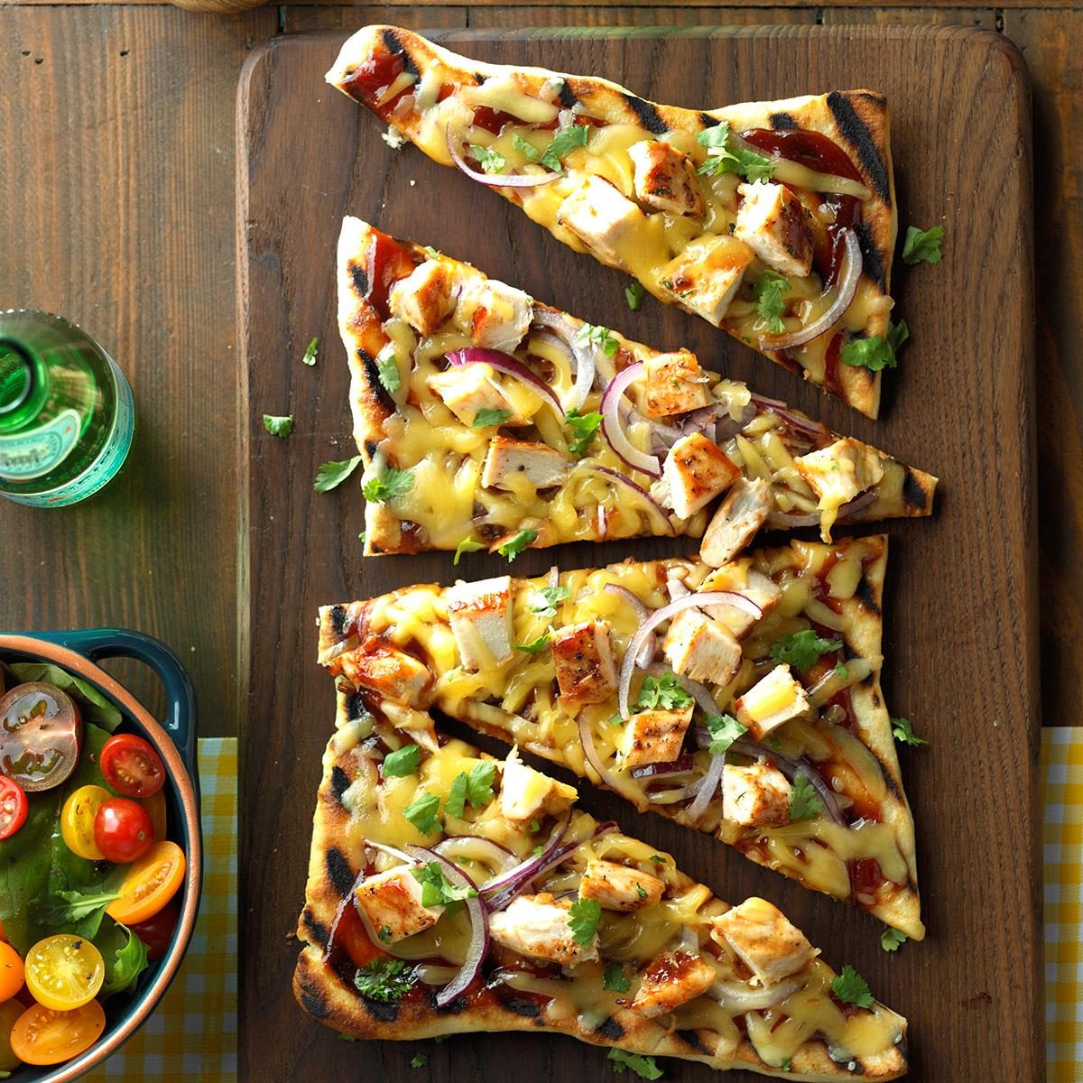 <p>So fast and so easy with refrigerated pizza crust, these saucy, smoky pizzas make quick fans with their rustic, hot-off-the-grill flavor. They're perfect for impromptu cookouts and summer dinners on the patio. —Alicia Trevithick, Temecula, California</p> <div class="listicle-page__buttons"> <div class="listicle-page__cta-button"><a href='https://www.tasteofhome.com/recipes/barbecued-chicken-pizzas/'>Go to Recipe</a></div> </div>