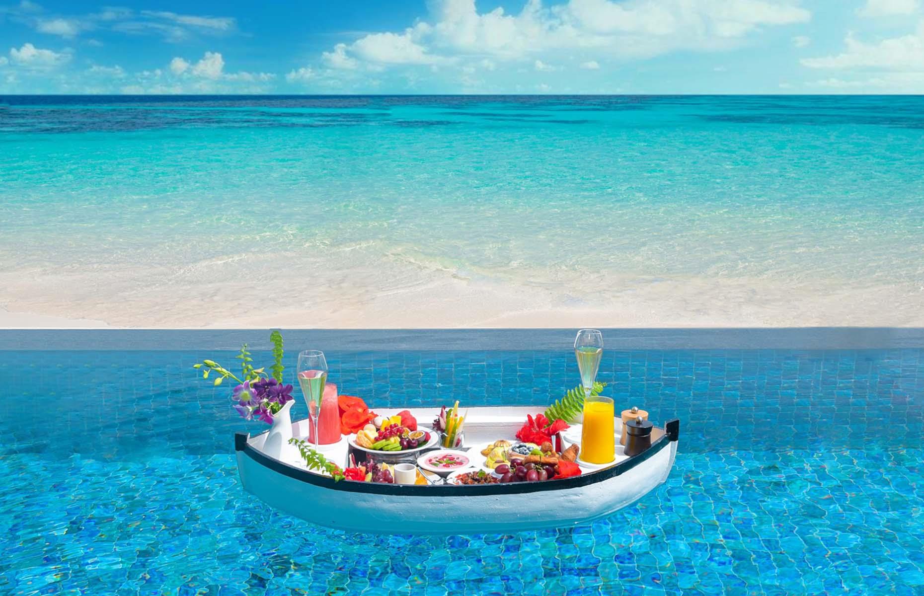 <p>Few of us will be fortunate enough to visit somewhere like <a href="https://www.marriott.co.uk/hotels/travel/mlexr-the-st-regis-maldives-vommuli-resort/">The St. Regis Maldives Vommuli Resort</a> in our lifetime, with its private lagoon, butler service, Ayurvedic spa and overwater villas. But dreaming is free, so let’s pretend for a moment. Breakfast (which is also free for paying guests) is presented at the resort’s signature poolside restaurant Alba. Its elevated takes on traditional favorites include poached egg with orange hollandaise and black truffle and a lobster omelet with crab and caviar. You can even opt for a floating breakfast, complete with tropical fruits and bubbly.</p>