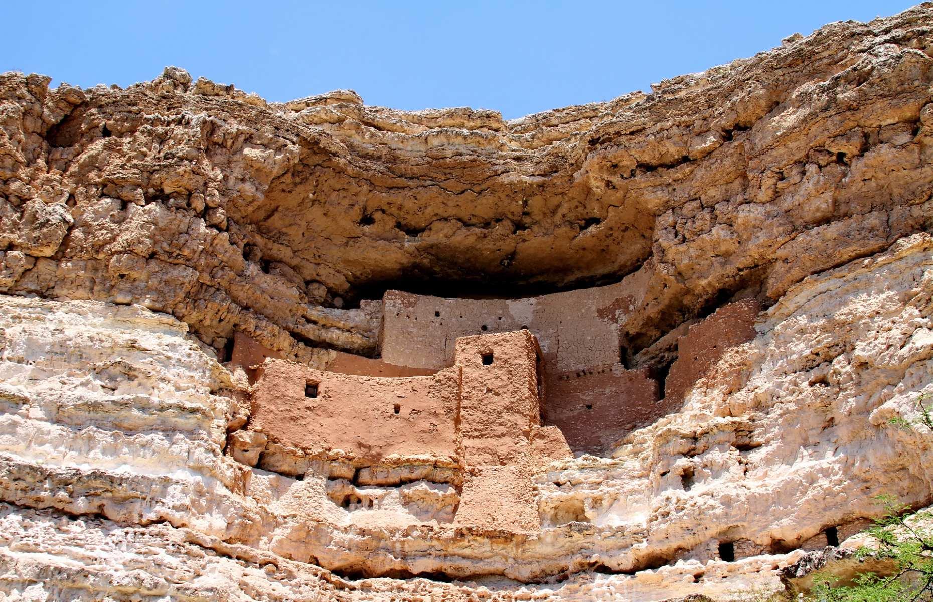 <p>With its impressive location, tucked in the limestone cliffs in the desert of Camp Verde, Montezuma Castle is sort of like an ancient skyscraper. Towing some 80 feet (20m) above the valley floor, the 20-room residence was built by the Sinagua people, beginning in around AD 1100, and served as an important shelter to escape floods. It was among the first four sites given the designation of National Monument back in 1906, with the site also including further dwellings around Montezuma Well, six miles (9.7km) from the castle.</p>