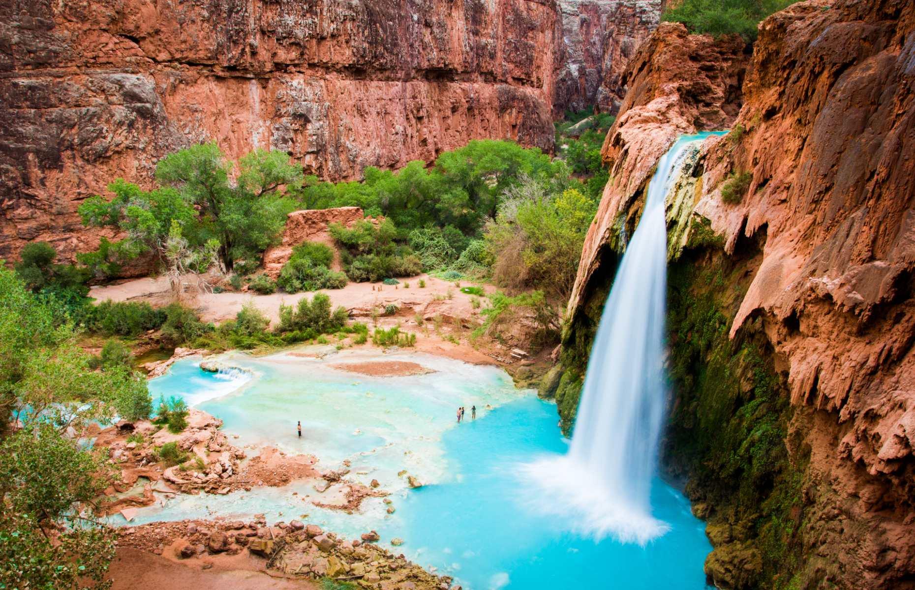 <p>With their vibrant cyan waters, it’s hard to believe Havasu Falls are real. And while they’re one of Arizona’s best-loved natural wonders, seeing them with your own eyes might be a little harder: they’re located on Havasupai Indian Reservation, so visitors need to buy a permit from the Havasupai Tribe to access the area (tourism is currently suspended at the site <a href="https://www.nps.gov/grca/planyourvisit/havasupai.htm">to restrict the spread of COVID-19</a>). If you manage to get a permit, you’ll need to prepare for two to three days of challenging hikes across steep terrain and in hot conditions, before you can take a dip in the majestic falls.</p>