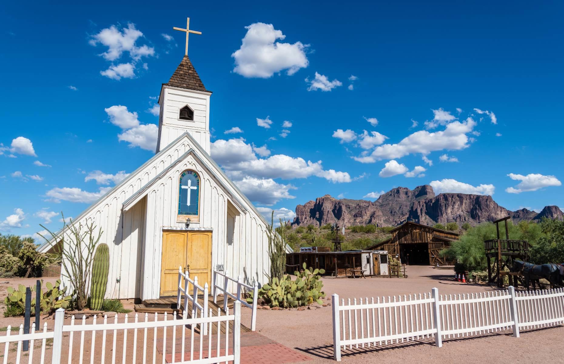 <p>For a combination of stunning scenery and Wild West movie memorabilia, head to the Superstition Mountain Museum. Located at the foot of its namesake mountains, which are well worth exploring via the Apache Trail if you’ve the time, its 4,900-square foot (455sqm) exhibition hall houses an eclectic mishmash of Old West scenes from famous movies, horse-drawn carts and a historical model railroad. There’s also the Elvis Chapel, a small museum and wedding chapel paying homage to The King, whose western movie <em>Charro! </em>was filmed here. </p>