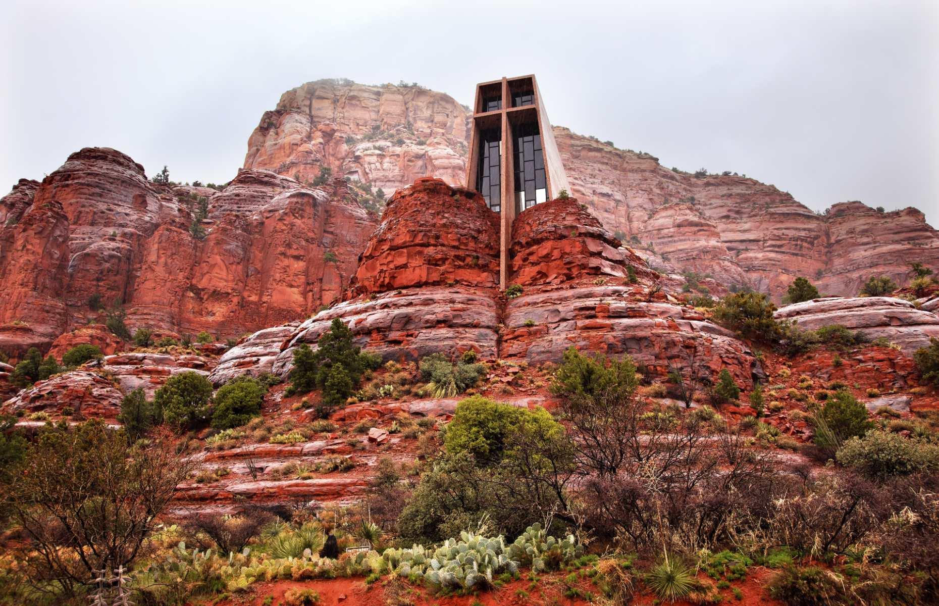 <p>Perched in the red rocks high above the town of Sedona, the Chapel of the Holy Cross is one of Arizona’s most unexpected sights. The ultra-modern looking structure was completed in 1956 and was the brainchild of local sculptor Marguerite Brunswig Staude, who took inspiration from the striking design of the Empire State Building. The main stained-glass window is held together by a giant cross and offers a spectacular view from inside, so it’s well worth popping in (the church is open from 9am to 5pm every day and can be visited for free). </p>