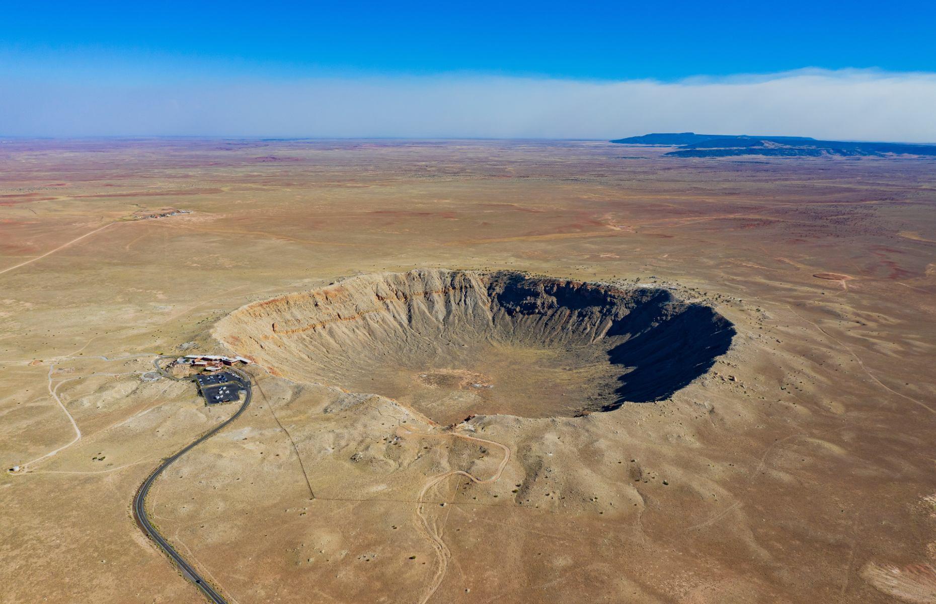 <p>At 50,000 years-old, Meteor Crater (also known as Barringer Crater) located just off the Interstate 40 in northern Arizona is actually young compared to other craters on Earth. What’s more, the 3,900-foot (1,189m) wide hollow is considered the best-preserved example out there. To visit the extraterrestrial attraction, you’ll need a ticket to the adjoining <a href="https://meteorcrater.com/">museum</a>, which also has a 4D theater for learning about the impact of asteroid collisions, an Apollo 11 Space Capsule and an interactive space exhibit.</p>