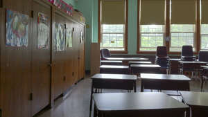 Empty Classroom In Elementary School. Education Images/Universal Images Group via Getty Images