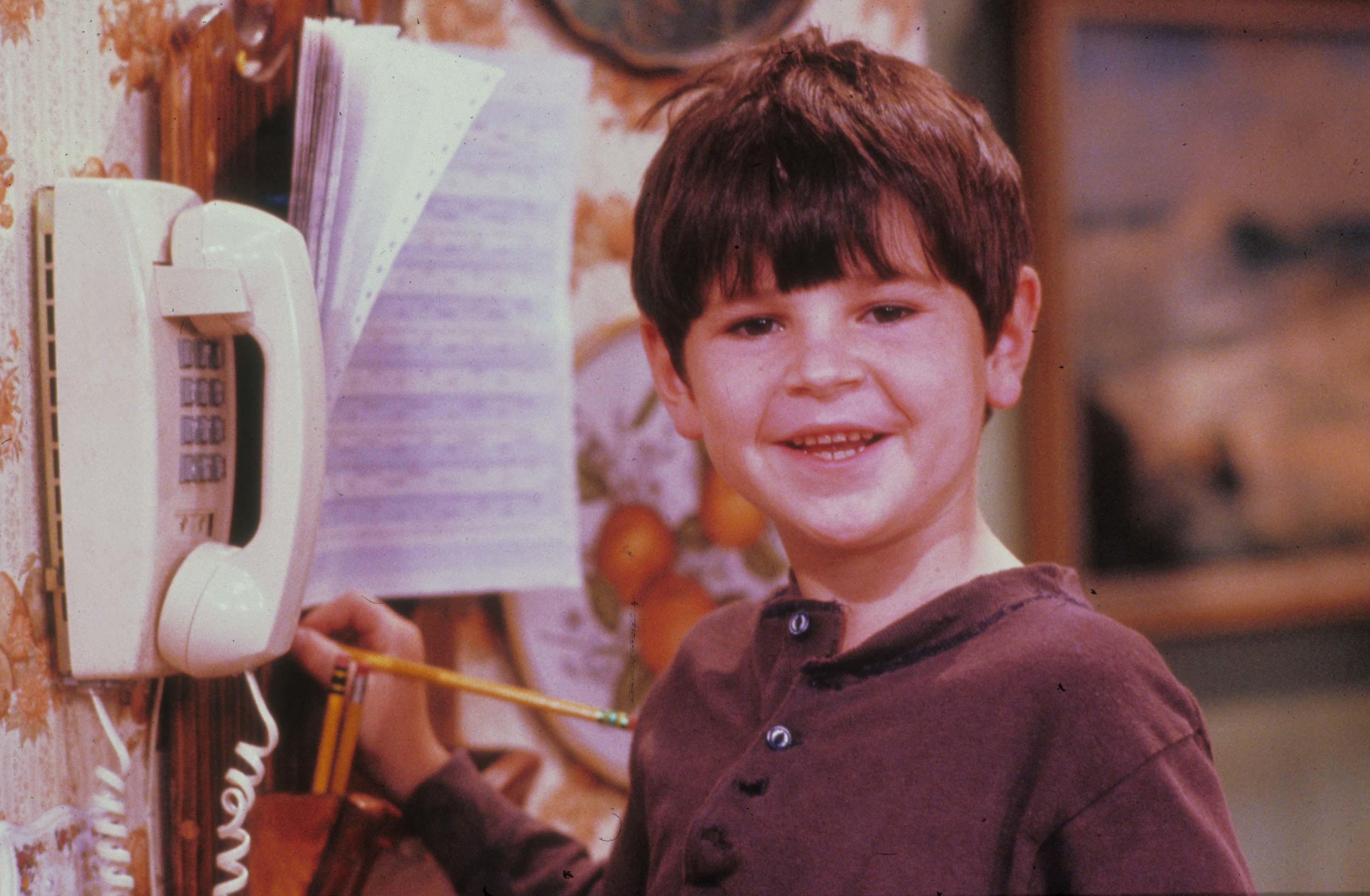 <p>A 6-year-old Michael Fishman made his acting debut playing Roseanne Barr's son on the sitcom "Roseanne" in 1988.</p>