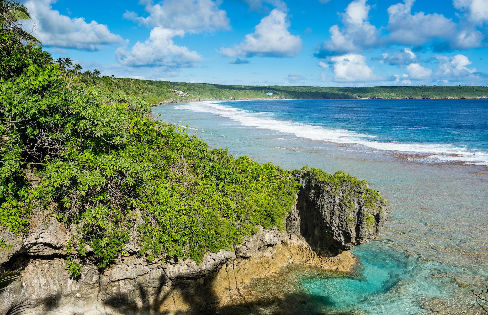 <p>It might be one of the largest raised coral atolls on Earth, but this Pacific island is as petite as countries come. Home to a population of less than 1,650 people, Niue is a self-governing island state in free association with New Zealand. Cast adrift 1,491 miles (2,400km) northeast of the Antipodean nation, it lies in the center of a triangle of other Polynesian islands – Tonga, Samoa and the Cook Islands – and is proudly the world's smallest self-governing nation. With just one large resort and several little guest houses and apartments, Niue is just the spot for that get-away-from-it-all slice of island life.</p>