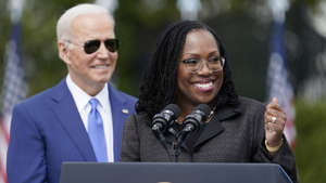 President Biden listens as Judge Ketanji Brown Jackson speaks during an event on the South Lawn of the White House in Washington, Friday, April 8, 2022, celebrating the confirmation of Jackson as the first Black woman to reach the Supreme Court. (AP Photo/Andrew Harnik) AP Photo/Andrew Harnik