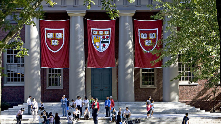 Harvard banners hang outside Memorial Church on the Harvard University campus in Cambridge, Massachusetts, on Friday, Sept. 4, 2009. Getty Images