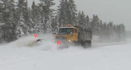 FILE. A snow plow clears the highway.