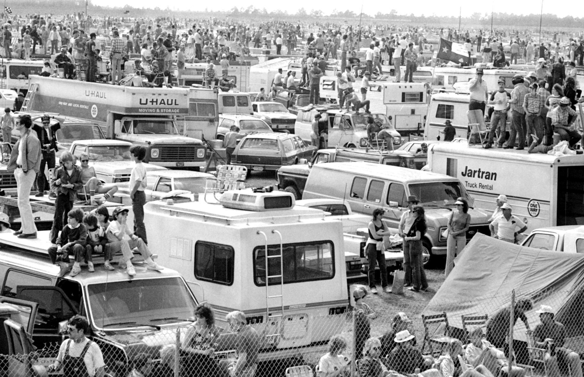 Opened in 1959, Daytona International Speedway began to host popular car and motorcycle events from the 1960s, which drew in a huge range of spectators. Pictured here are eager National Association for Stock Car Auto Racing (NASCAR) fans – in their cars, camper vans and even rented U-Haul vans – gathered to watch the 1985 Pepsi Firecracker 400 race.