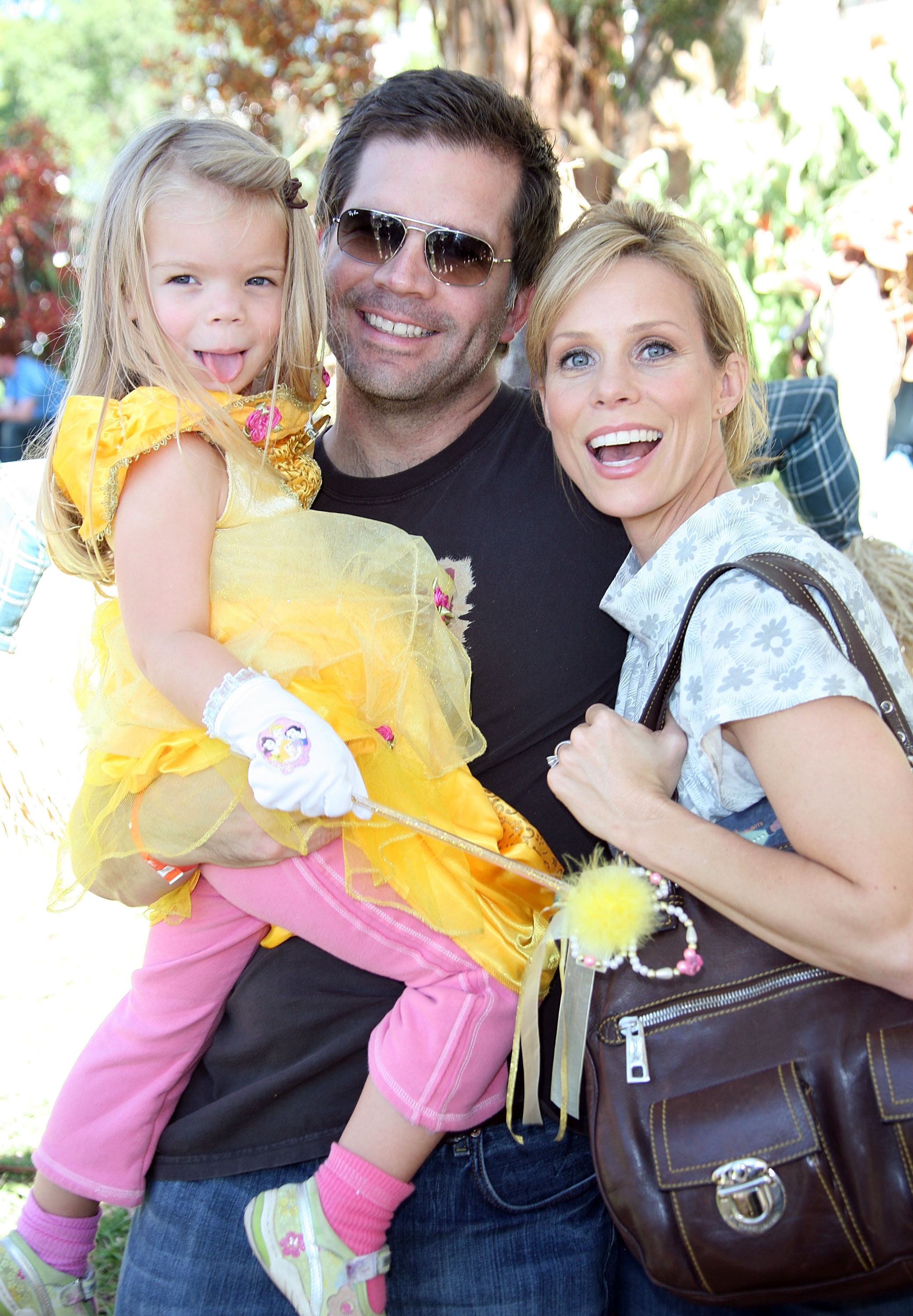 <p>"Curb Your Enthusiasm" star Cheryl Hines and first husband Paul Young, a Hollywood producer and manager, brought their then-3-year-old daughter, Catherine Rose, to the Camp Ronald McDonald 15th Annual Family Halloween Carnival in Los Angeles on Oct. 21, 2007. Cat's since grown into a very beautiful young woman...</p>