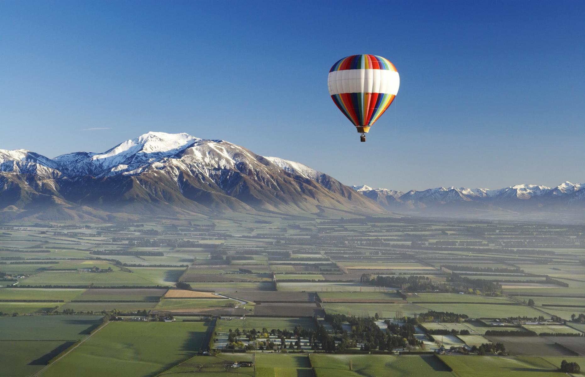<p>Floating over the panoramic Canterbury Plains landscape is a never-to-be-forgotten experience. Hot air ballooning here is at its most magical and peaceful at sunrise. <a href="https://ballooningcanterbury.com/">Ballooning Canterbury</a> offers hour-long flights and balloon fiestas where you have the opportunity to float among other balloons.</p>  <p><strong><a href="https://www.loveexploring.com/galleries/81915/the-worlds-most-incredible-hot-air-balloon-rides?page=1">The world's most incredible hot-air balloon rides</a></strong></p>