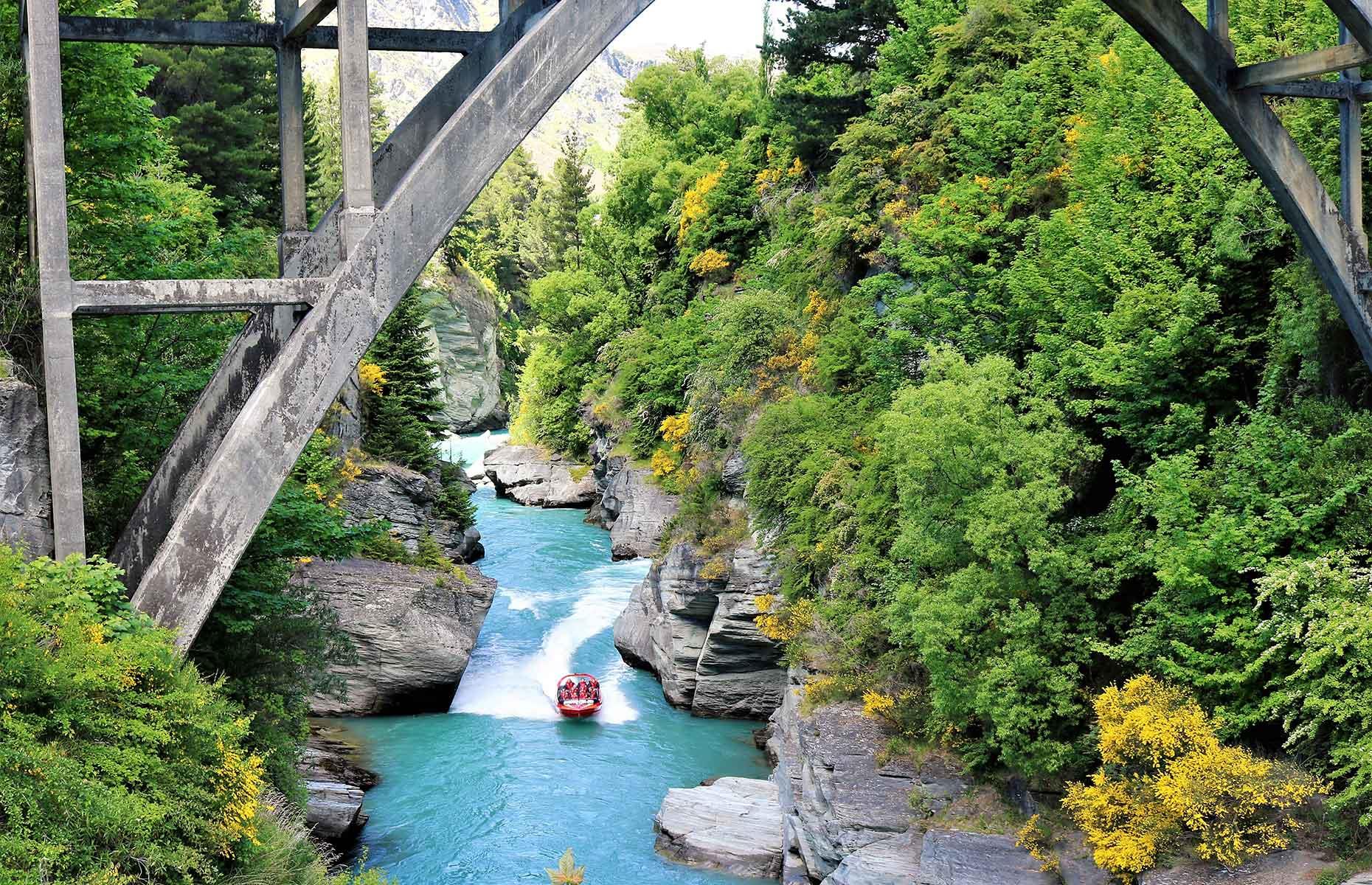 <p>The unbelievably blue waters of the fast-flowing Shotover River are a mesmerising spot for jet-boating on the <a href="https://www.shotoverjet.com/">Shotover Jet</a>. Your heart is in your mouth as you race through the rocky and narrow canyon, skimming rocks and spinning through sharp turns. The jet is owned by the Ngāi Tahu, the Māori people of this land, and is the only company allowed to operate in this area of the river.</p>
