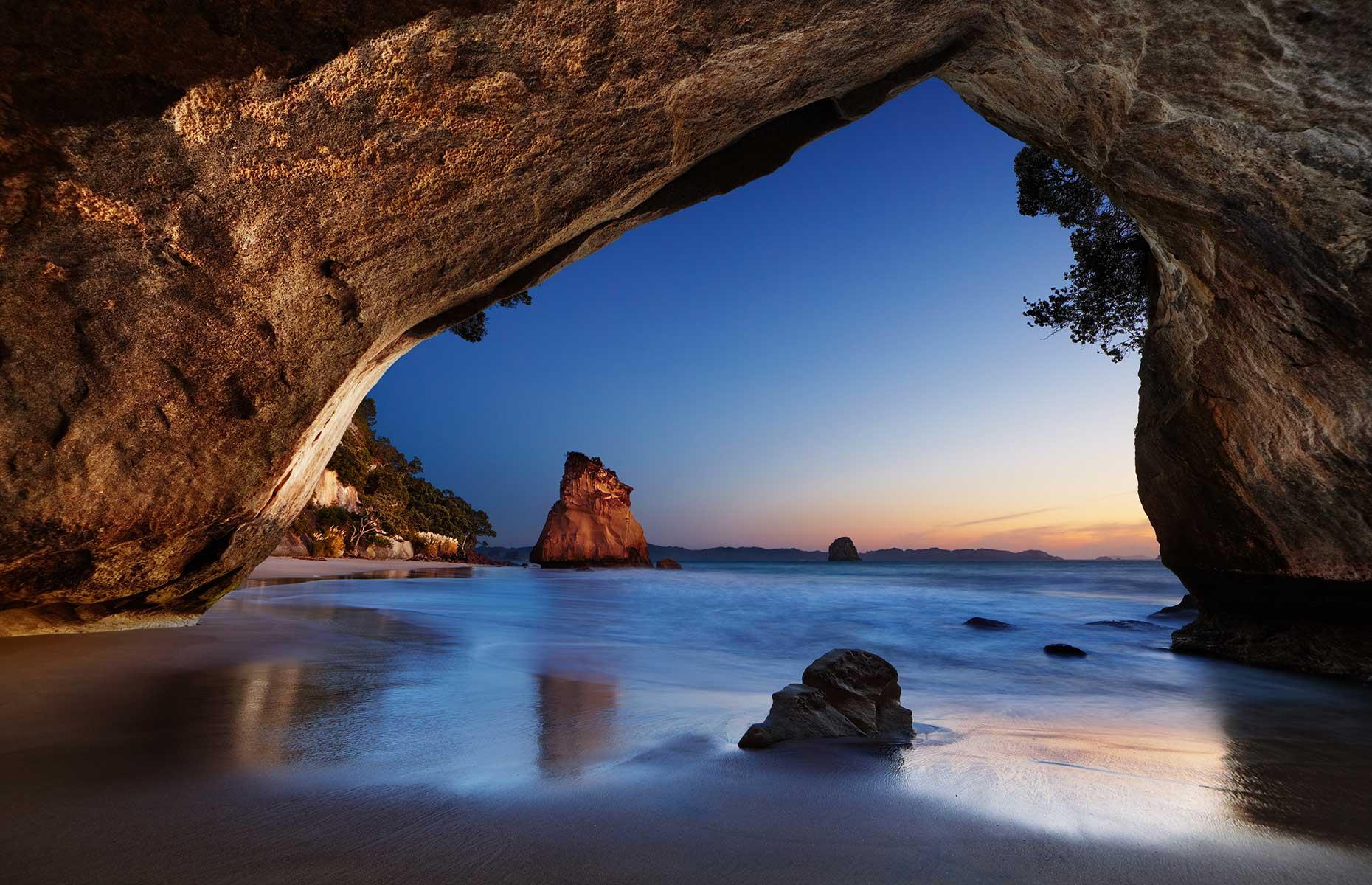 The Coromandel’s secluded Cathedral Cove is picture-perfect, framing a stand-alone rock that rises from the turquoise sea on the east coast of the North Island. For a different perspective (and to avoid the summer crowds) take the 'viewing platform' detour, a mile-long (1.6km) loop that offers views down onto the rock.