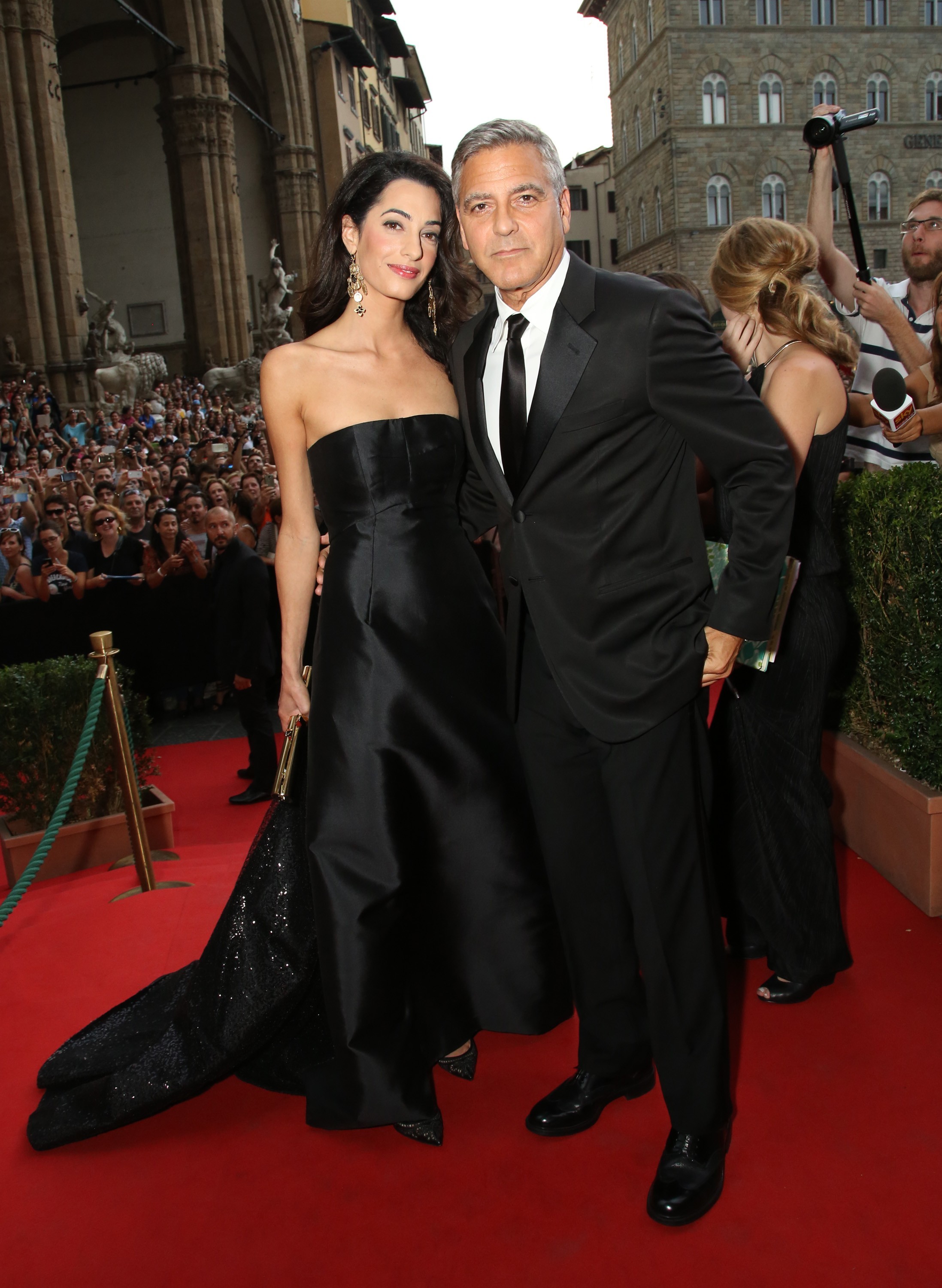 <p>Sparks flew when <a href="https://www.wonderwall.com/celebrity/profiles/overview/george-clooney-283.article">George Clooney</a> met British barrister Amal Alamuddin for the first time in July 2013 -- and his parents were there to witness it all. "We met in Lake Como. She was a friend of a friend who came to visit and then I chased her for many months, calling and writing, those kinds of things," George told David Letterman in 2015. George's father, journalist Nick Clooney, recounted that magical night when Amal and George were introduced at a dinner gathering the actor was hosting at his home. "[George's mom] Nina and I were actually the ones who answered the door when Amal came in," Nick told People in June 2017. "She introduced herself to us and we talked. She was obviously very charming, gorgeous and so clearly accomplished, but by the time we had supper that night, it was clear there was a kindness to her and an inclusiveness." By the time the dinner was over, "his and her fates were sealed, both of them. She was so remarkable and he was so remarkable around her," Nick added. "This young woman meant something to him almost immediately. It was just amazing." As Nick got to know Amal, things crystallized further. "It was just different than all the other relationships I had seen him in, and I had watched them all from the time he was 13," Nick said. Just one year later in September 2014, they married in Venice, Italy, and the bride changed her name to <a href="https://www.wonderwall.com/celebrity/profiles/overview/amal-clooney-1566.article">Amal Clooney</a>.</p>
