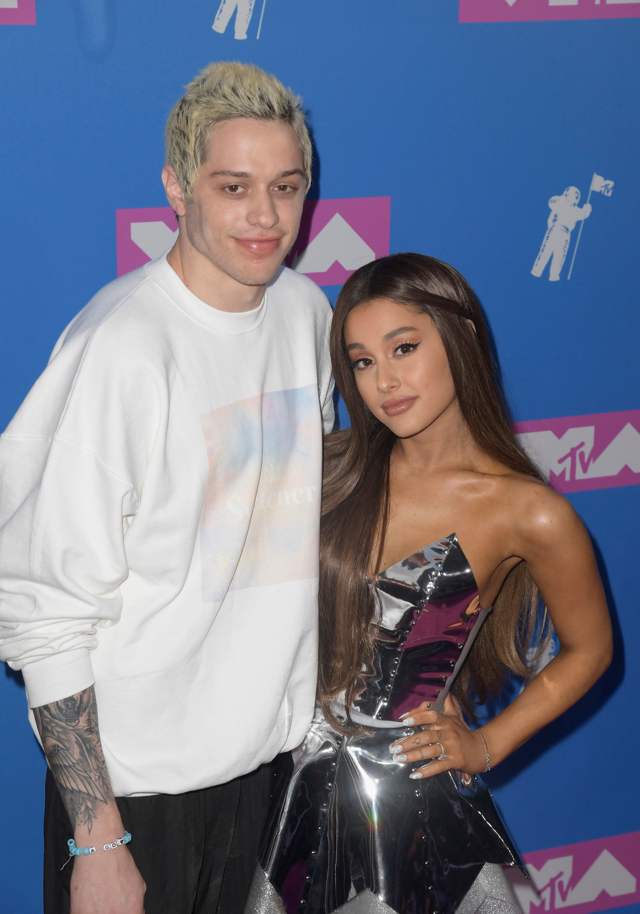 <p><a href="https://www.wonderwall.com/celebrity/profiles/overview/ariana-grande-1540.article">Ariana Grande</a> and Pete Davidson's whirlwind romance in the summer of 2018 might have ended in a <a href="https://www.wonderwall.com/news/ariana-grande-pete-davidson-split-breakup-end-engagement-report-3016840.article">broken engagement</a> that fall, but that doesn't make the former couple's meet cute any less remarkable. Both appeared on "Saturday Night Live" for the first time on the Season 40 opener -- her as the musical guest, him as a new cast member. But they didn't meet then. That happened in March 2016 when Ariana came back to host and started meeting with "SNL" cast members and writers -- including Pete. "I was just, like, listening to him pitch me ideas and stuff and I was like, 'Oh my god.' I just thought he was super-dope," Ariana told the "Zach Sang Show" years later, adding that she grew more intrigued after spotting Pete's Harry Potter-themed tattoos while she was rehearsing her monologue. After their initial meeting, she told a friend (who confirms her story is true), "I'm going to marry him." Time went by. "We didn't even talk for years -- we weren't even friends or anything," she explained. Fast-forward to May 7, 2018. Ariana's manager, Scooter Braun encouraged Pete to go hang out with the "Thank U, Next" singer at her New York City apartment after the <a href="https://www.wonderwall.com/style/fashion/2018-met-gala-see-all-stars-fashions-big-event-3014142.gallery">Met Gala</a> let out that night. "I was f---ing sh---ing my pants," Pete -- who was in sweats and a T-shirt while the pop star was still all dressed up after having attended the fashion benefit -- told Howard Stern, explaining that they played "Quiplash" with some of her friends when he arrived. When Ariana's pals left, "I literally was like, 'Hi, can I kiss you, please?'" Pete told Howard. A month later, they were <a href="https://www.wonderwall.com/celebrity/ariana-grandes-engagement-ring-cost-pete-davidson-almost-100k-plus-more-news-3014779.gallery">engaged</a>.</p>