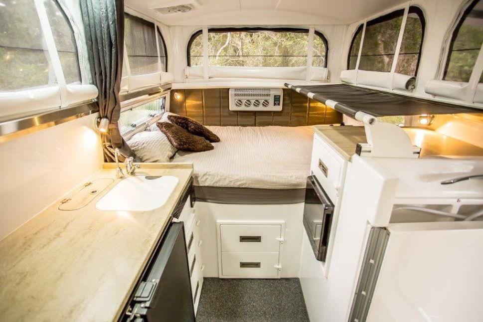 At just about 14 feet in length, this RV is on the snug side but it uses that space efficiently. There’s a queen-sized bed plus two sleeping lofts, a kitchenette, seating for five, and an outdoor range and sink for meals al fresco. And no matter where you roam, the Explorer can connect to communications satellites so you can stream a live feed from the RV’s five external cameras.