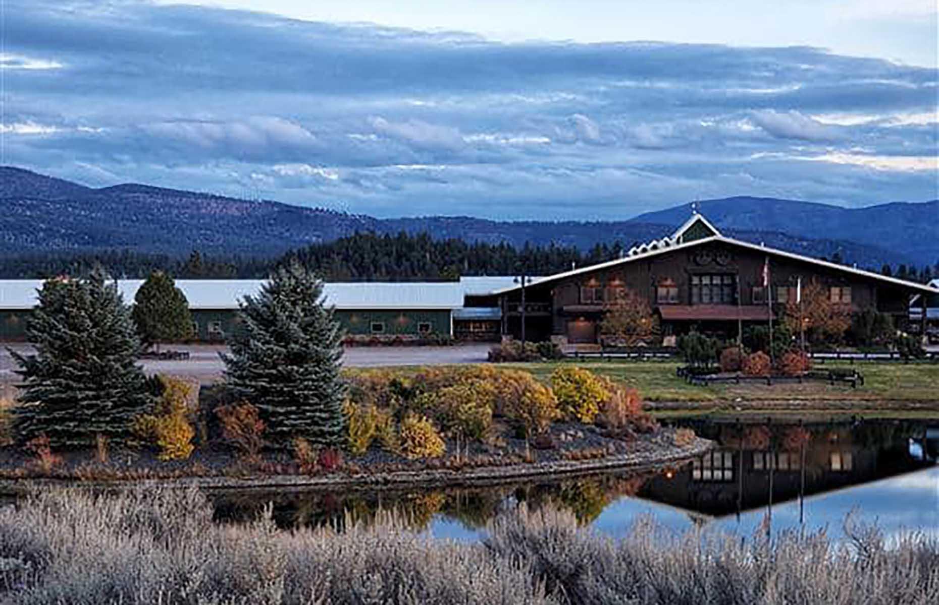 <p>This lavish property is a level up from a classic hotel, offering a series of lodges and glamping options across 37,000 acres of Montana's wilderness, on a working cattle ranch. It's set out along the Blackfoot River and guests can strap in for all sorts of outdoor adventures, from rafting and climbing to horse-back riding – the Saddle Club (pictured) is the largest private equestrian center in the state. If you'd prefer to slow the pace, there's a spa (housed in a string of tents), while the on-site 's’moreologists' will help you make the perfect, oozing s'mores.</p>