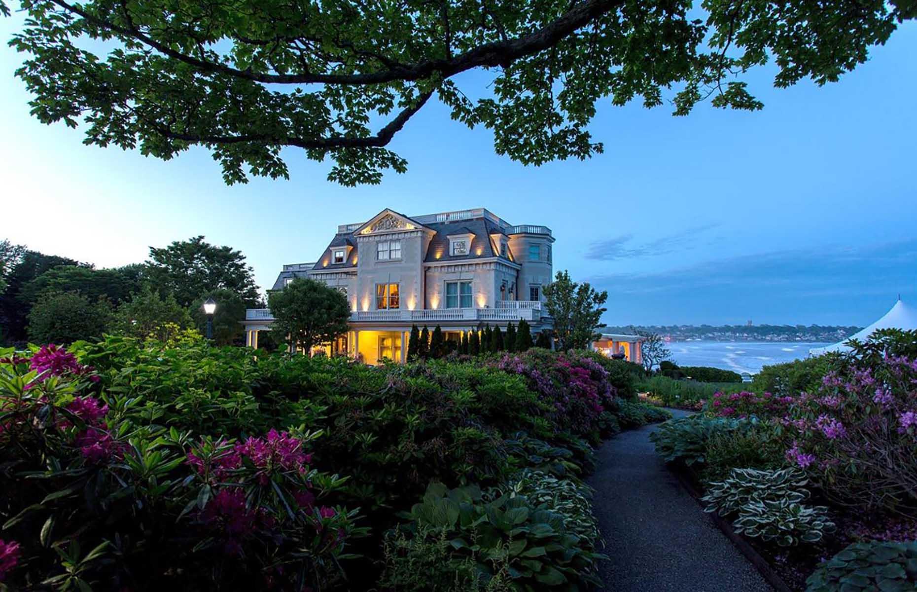<p>Few New England hotels can rival this one when it comes to location: The Chanler looks over the Atlantic from a bluff on Newport's famous Cliff Walk, a route studded with sumptuous Gilded Age mansions. The hotel is small but perfectly formed, with 20 neat rooms tucked away inside a 19th-century mansion – each room is designed to evoke a particular era, from dark wood and a curtained bed in the English Tudor suite to intricate molding and gilded details in the Renaissance chamber.</p>  <p><strong><a href="https://www.loveexploring.com/galleries/90765/the-most-glamorous-hotel-in-every-state">Discover your state's most glamorous hotel</a></strong></p>