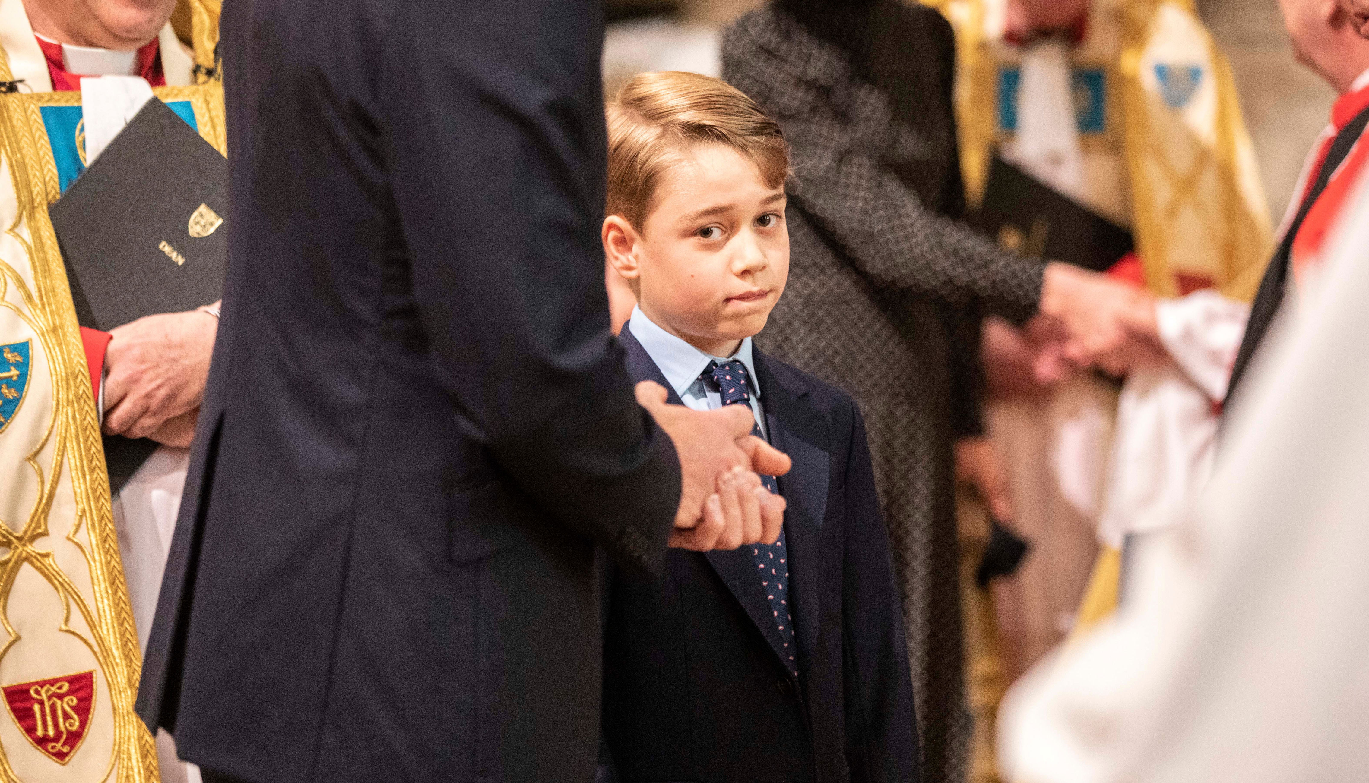 <p>Prince George stood next to his father as he waited to greet clergy members at <a href="https://www.wonderwall.com/celebrity/princess-charlotte-and-prince-george-join-william-kate-and-the-queen-more-great-photos-from-the-royals-prince-philip-memorial-service-of-thanksgiving-578498.gallery">the service of thanksgiving celebrating the life of his late great-grandfather</a>, Prince Philip, at Westminster Abbey in London on March 29, 2022.</p>