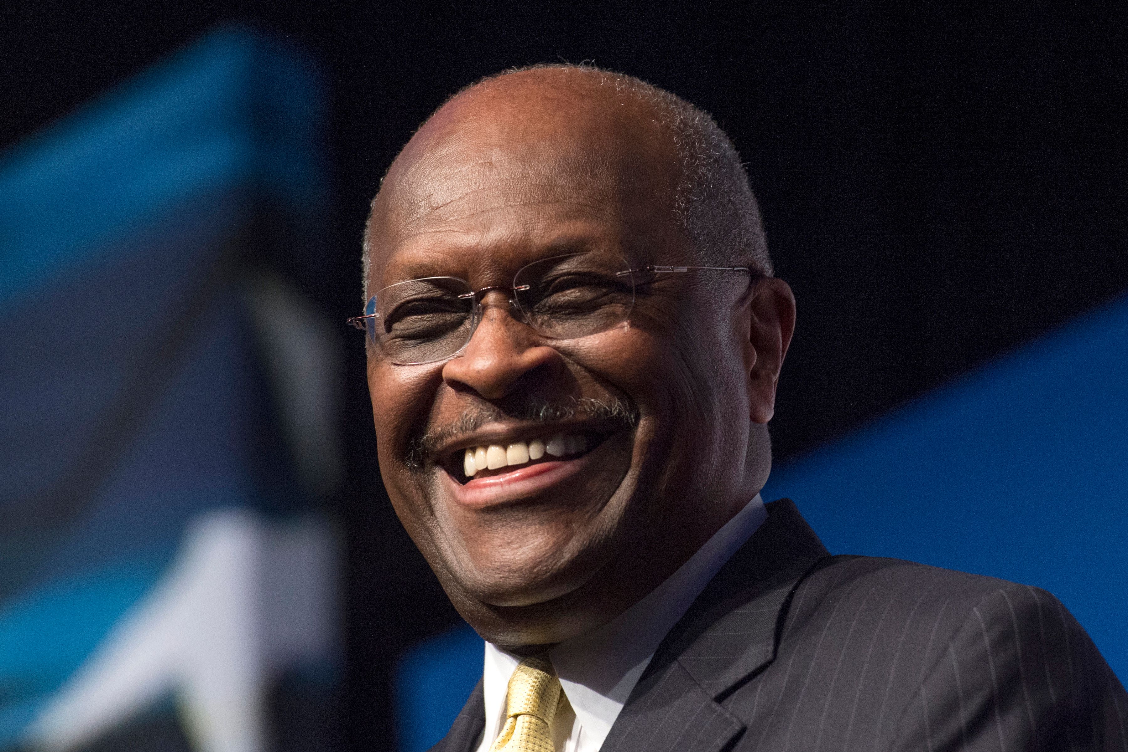 <p>Herman Cain, a former Republican presidential candidate and former CEO of Godfather's Pizza, died from complications of COVID-19, his website announced on July 30. The co-chair of Black Voices for Trump and contributor for conservative media outlet Newsmax was 74. "We knew when he was first <a href="https://www.wonderwall.com/celebrity/photos/famous-people-who-have-tested-positive-coronavirus-covid-19-3022493.gallery">hospitalized with COVID-19</a> [in early July] that this was going to be a rough fight. He had trouble breathing and was taken to the hospital by ambulance. We all prayed that the initial meds they gave him would get his breathing back to normal, but it became clear pretty quickly that he was in for a battle," HermanCain.com editor Dan Calabrese wrote. "There were hopeful indicators, including a mere five days ago when doctors told us they thought he would eventually recover, although it wouldn't be quick. … I'm sorry I had to bring you bad news this morning. But the good news is that we had a man so good, so solid, so full of love and faith ... that his death hits us this hard. Thank God for a man like that." </p>