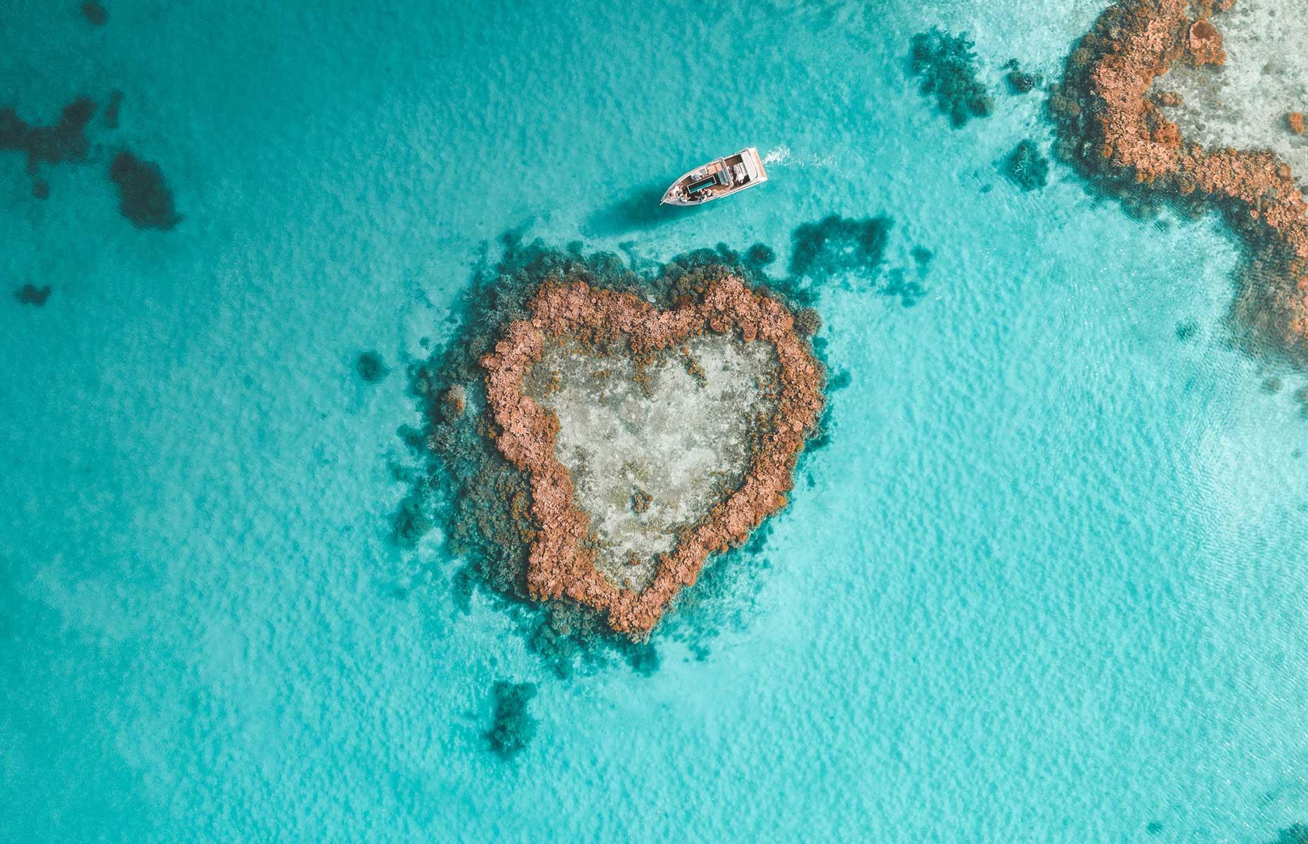 You might think you’re in the romantic Maldives or on a stunning Greek island, but Heart Reef is one of the most mesmerizing places in Australia. This tropical archipelago is a coral naturally formed in the shape of a heart and is only accessible by helicopter, seaplane or light plane tour, adding to its secluded charm. Board a glass-bottomed boat to watch the turtles and colorful fish glide through the turquoise waters.